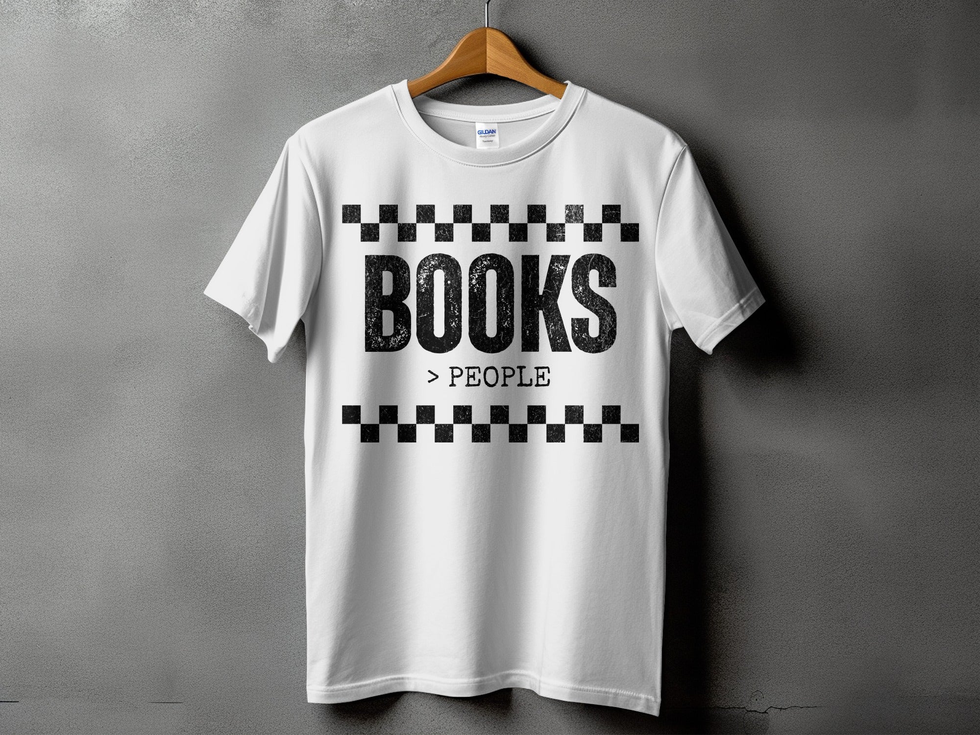 White t-shirt with "BOOKS > PEOPLE" graphic in distressed black print.