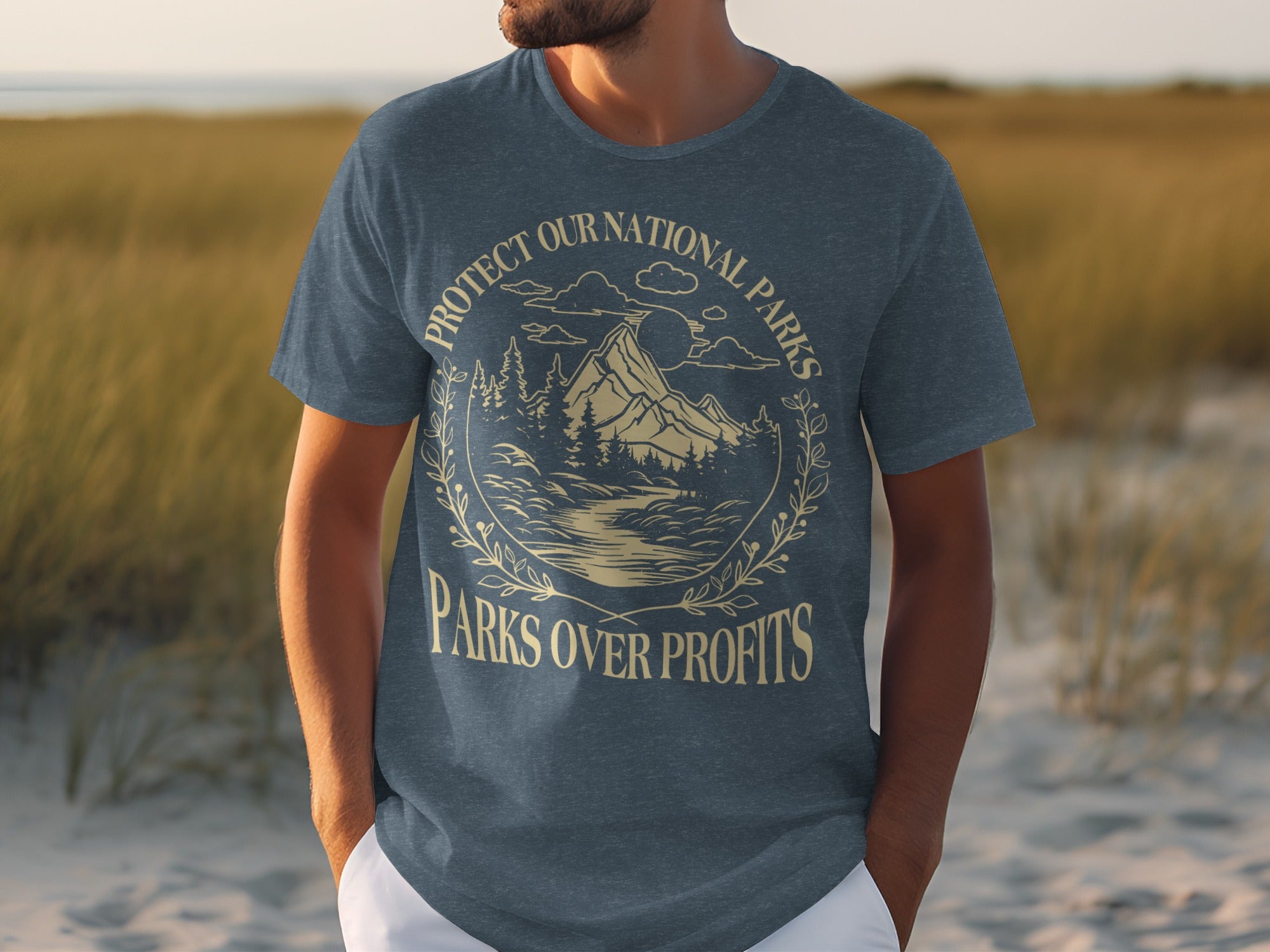 Navy t-shirt with "Protect Our National Parks Parks Over Profits" text and a mountain landscape design.