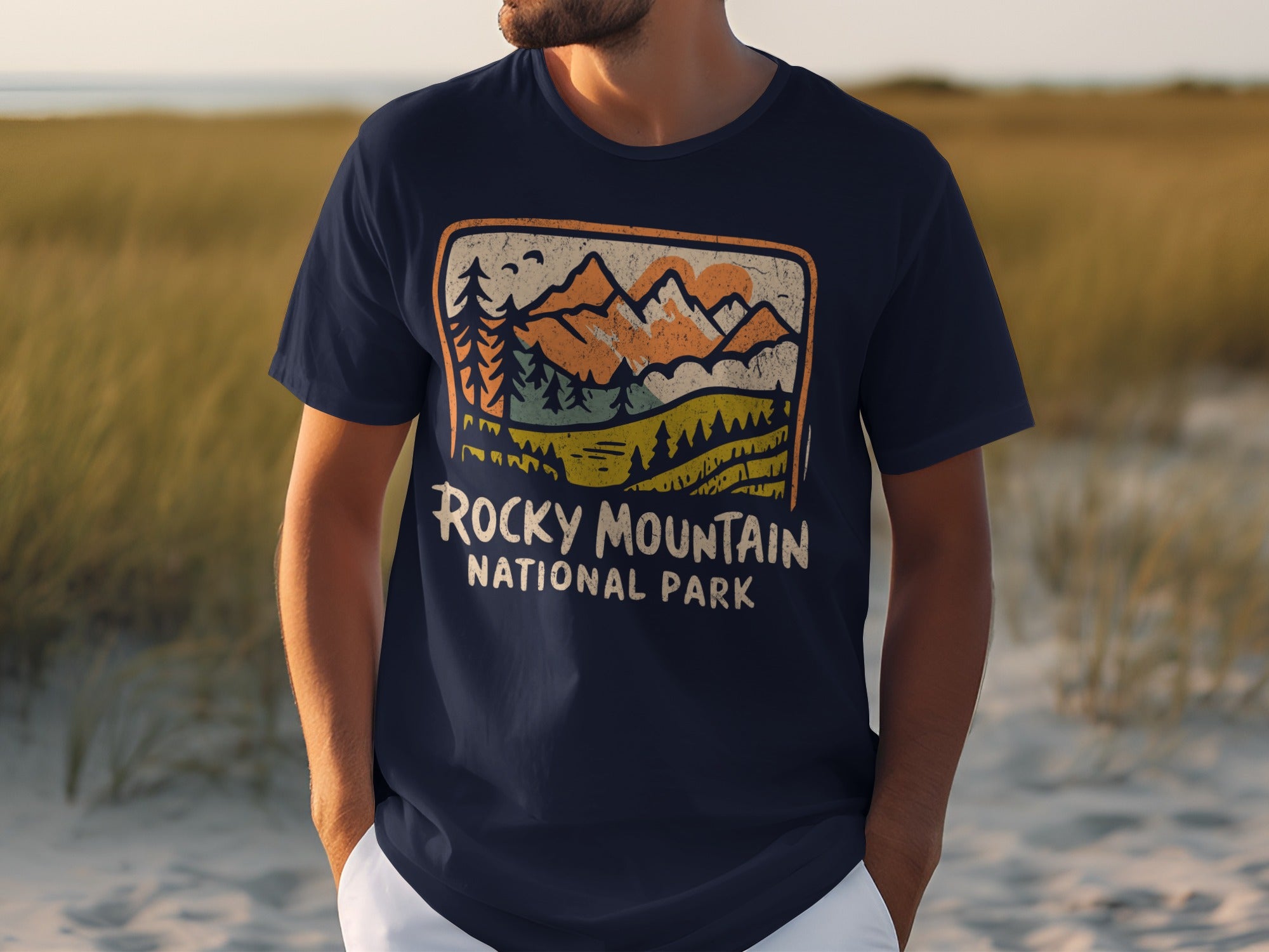 Navy t-shirt with vintage Rocky Mountain National Park mountain landscape graphic.