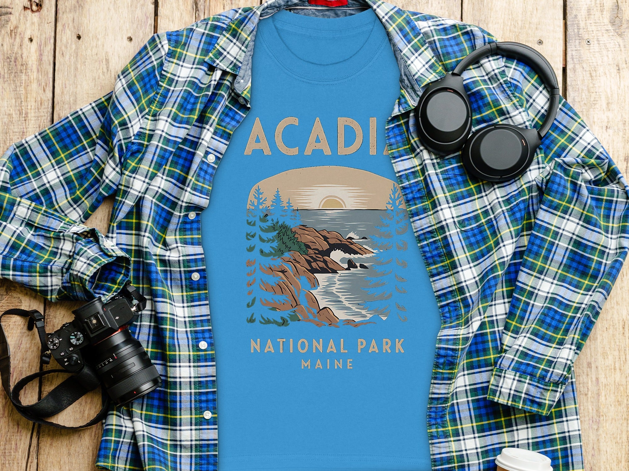 Blue t-shirt with "Acadia National Park Maine" graphic design.