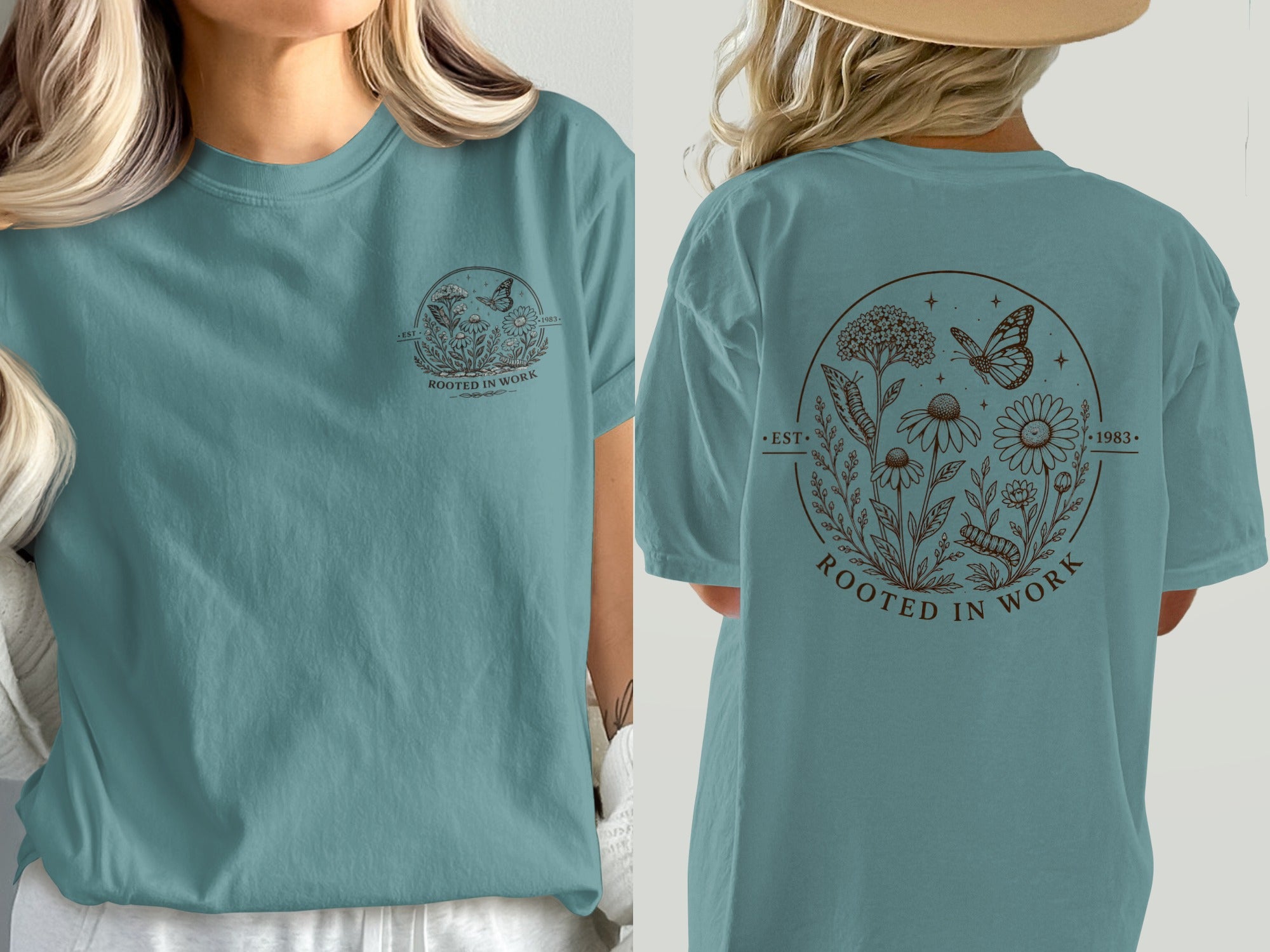 Teal t-shirt with circular brown floral graphic, butterfly, caterpillar, and text "EST. ROOTED IN WORK 1983."