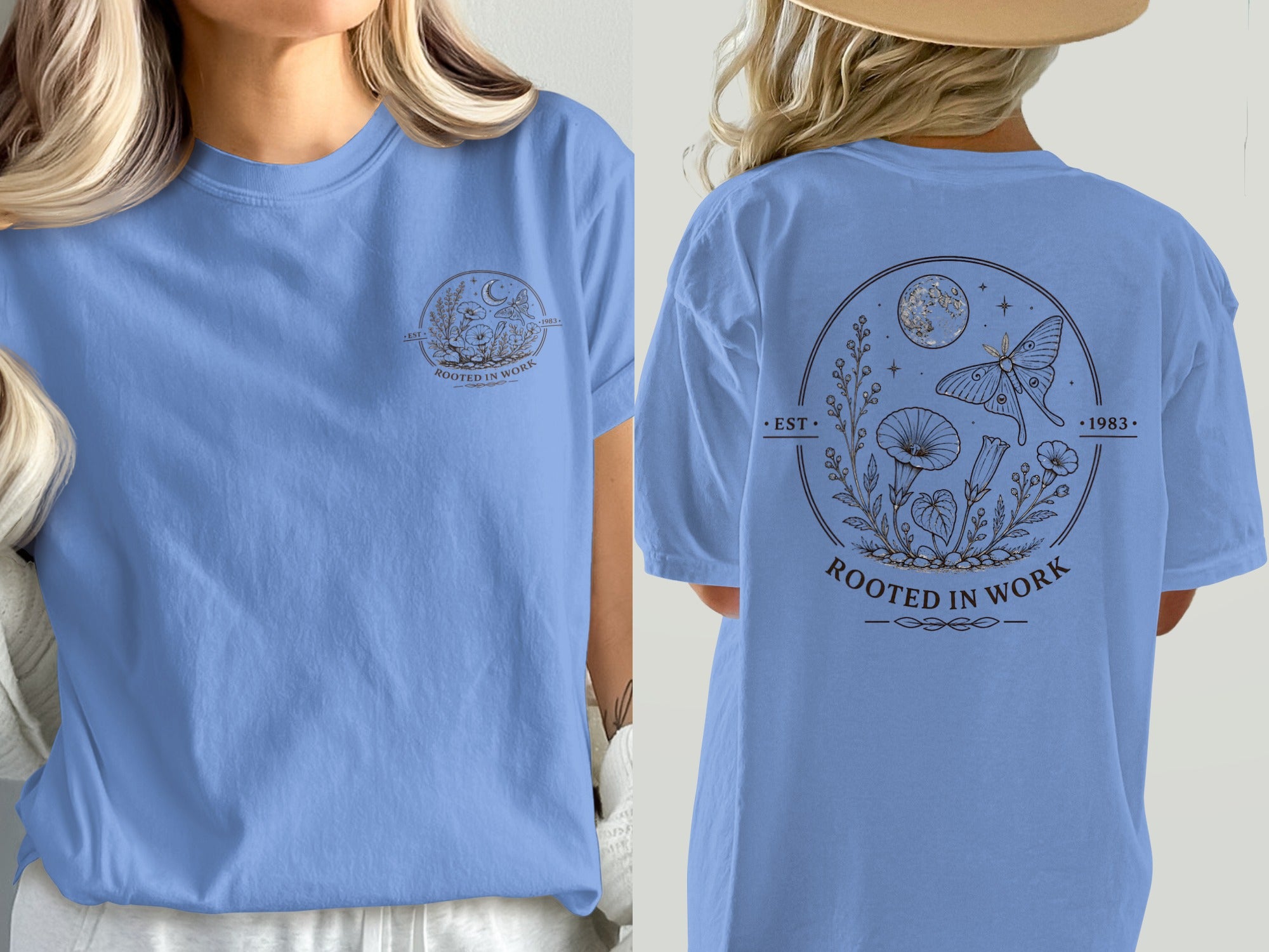 Blue t-shirt with a circular floral and moth graphic reading "Rooted in Work".