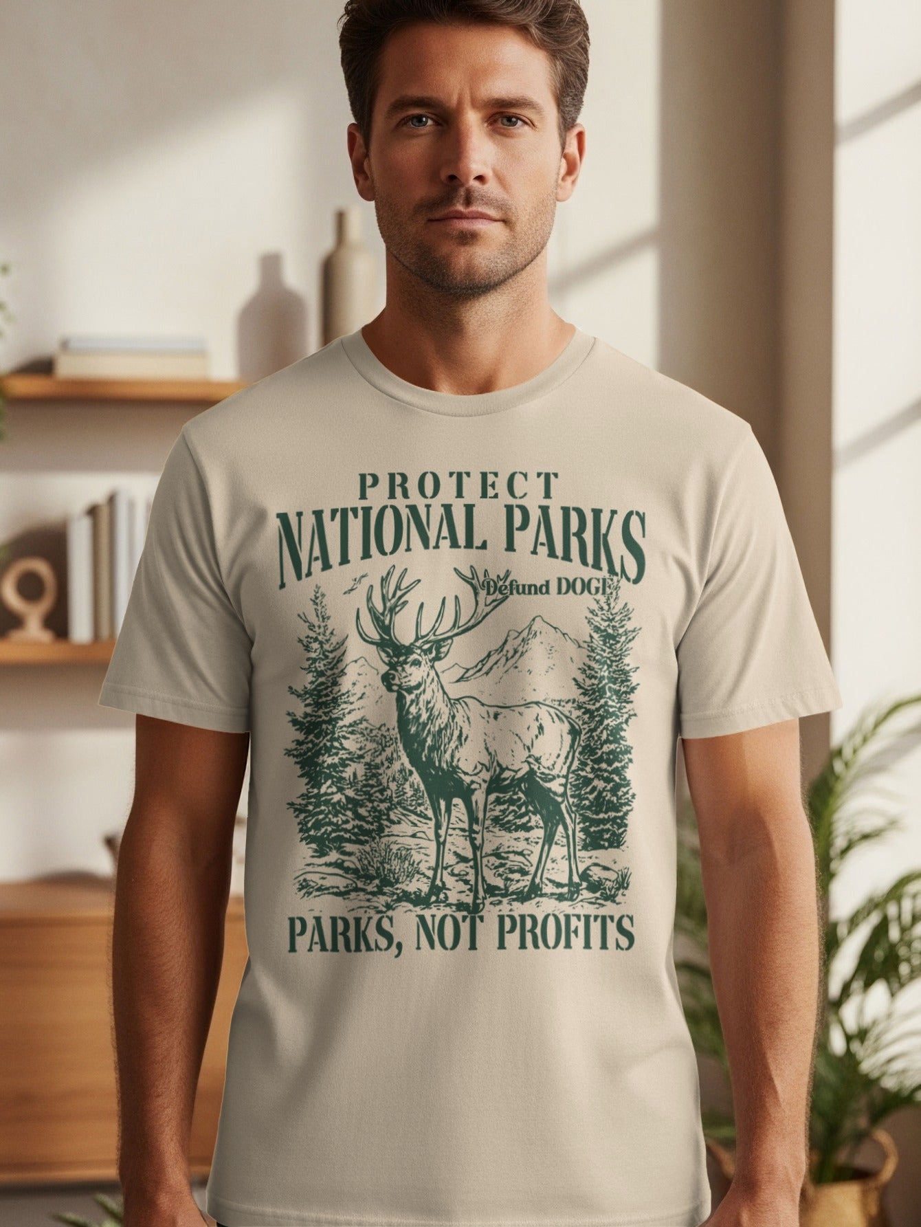 T-shirt graphic: deer, trees, mountains, text "Protect National Parks, Parks Not Profits".