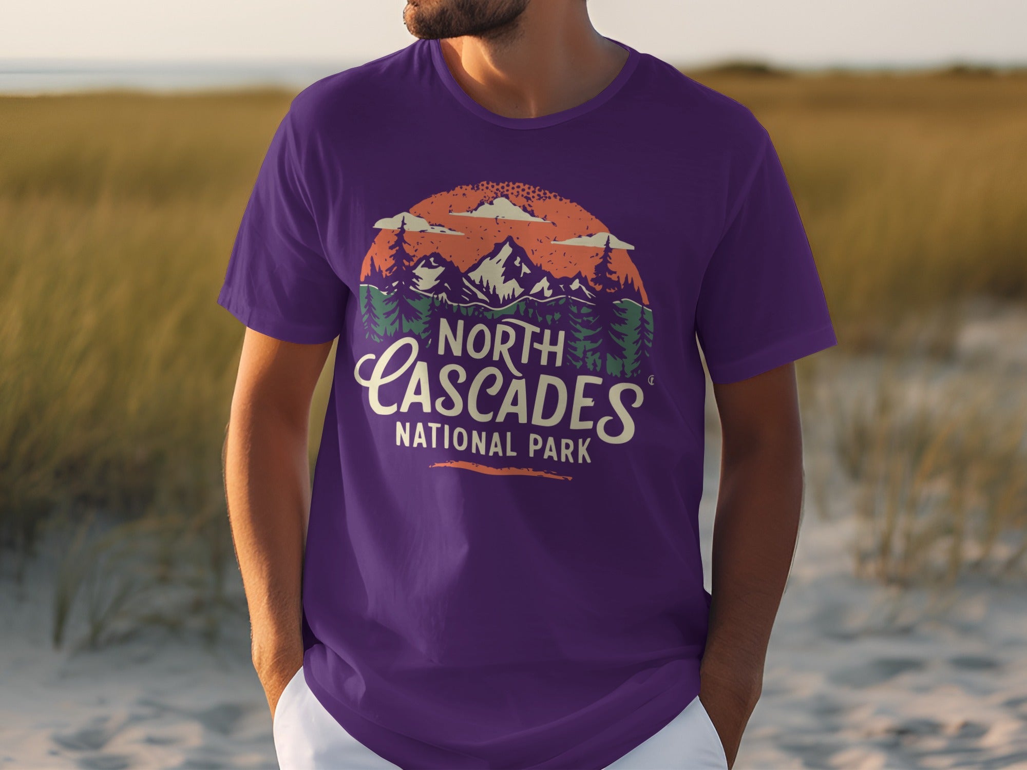 Purple t-shirt with North Cascades National Park text and mountain graphic