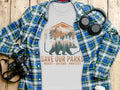 White t-shirt with "Save Our Parks Resist Defend Protect" graphic and bear.