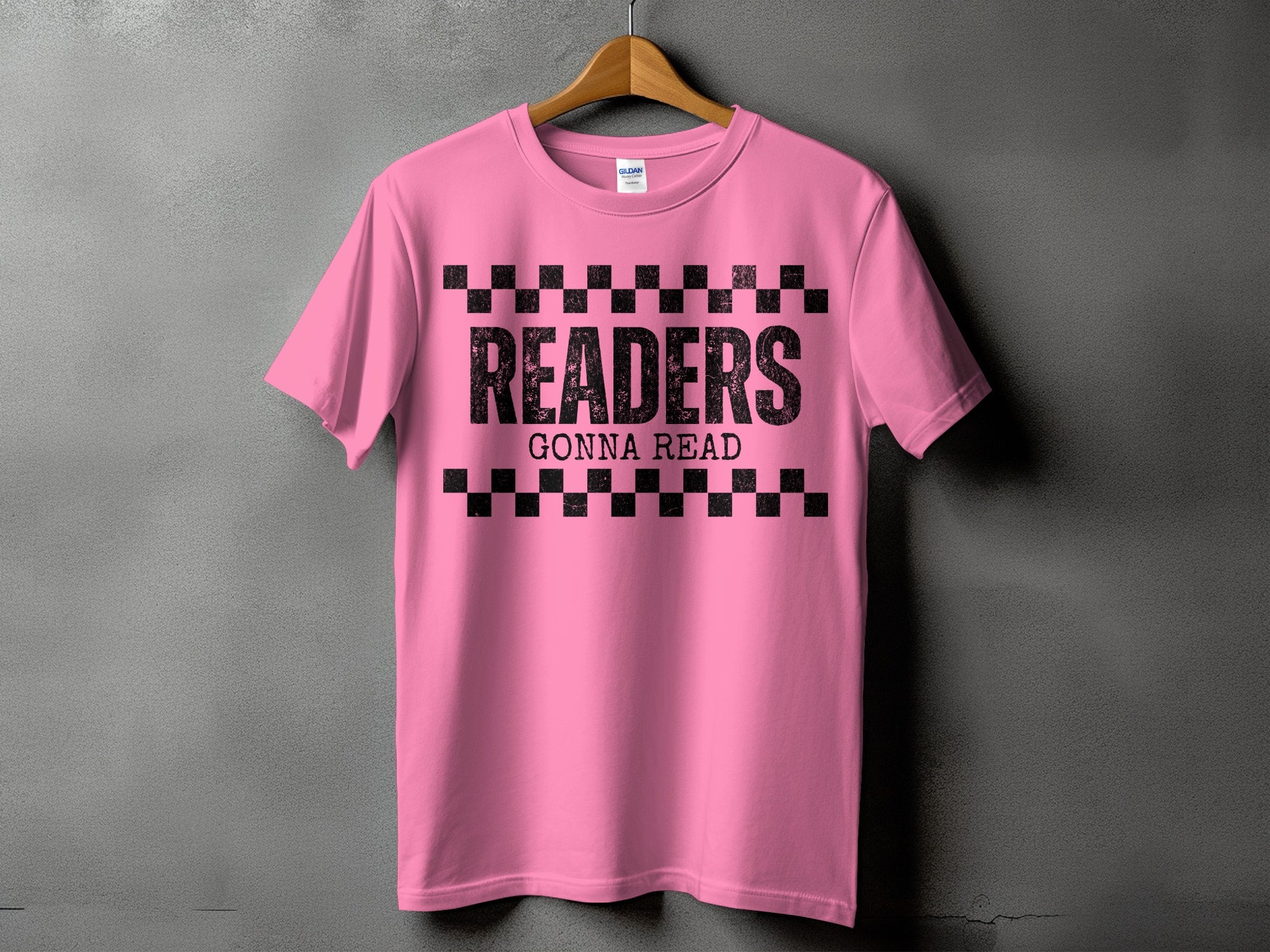 Pink t-shirt with distressed black text "READERS GONNA READ" and checkerboard detail.