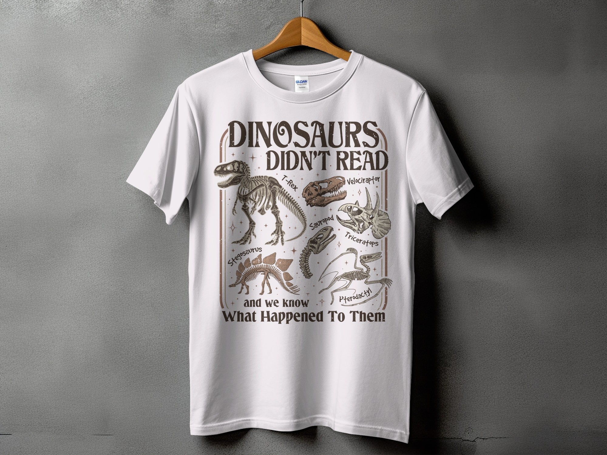 Dinosaurs didn't read and we know what happened to them graphic tee.