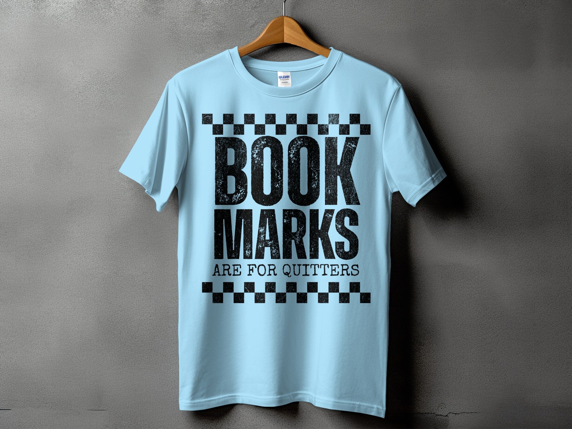 Light blue t-shirt with black distressed text: BOOK MARKS ARE FOR QUITTERS.
