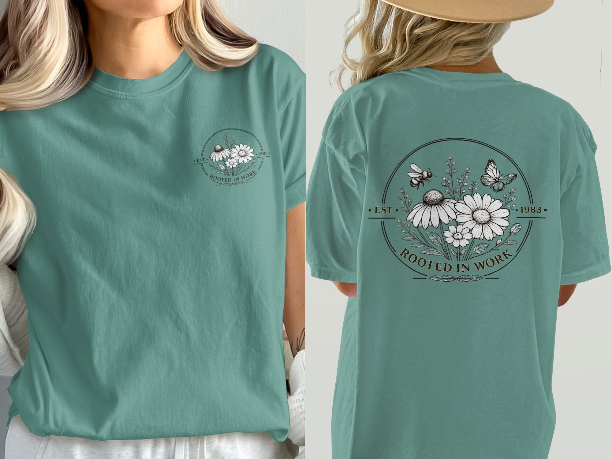 Teal graphic t-shirt with "Rooted in Work Est. 1983" floral design and insects.