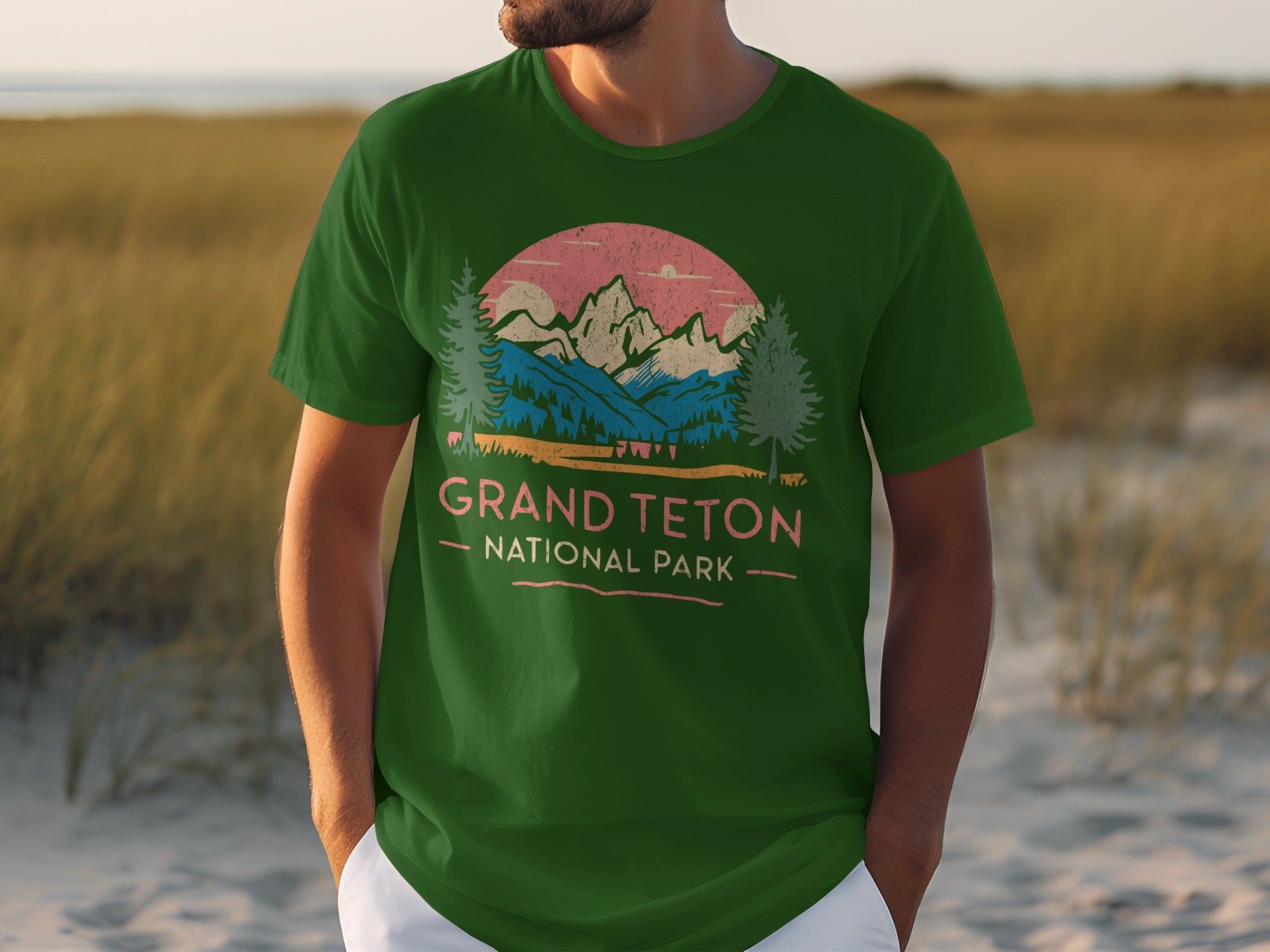 Green t-shirt with Grand Teton National Park graphic and text.