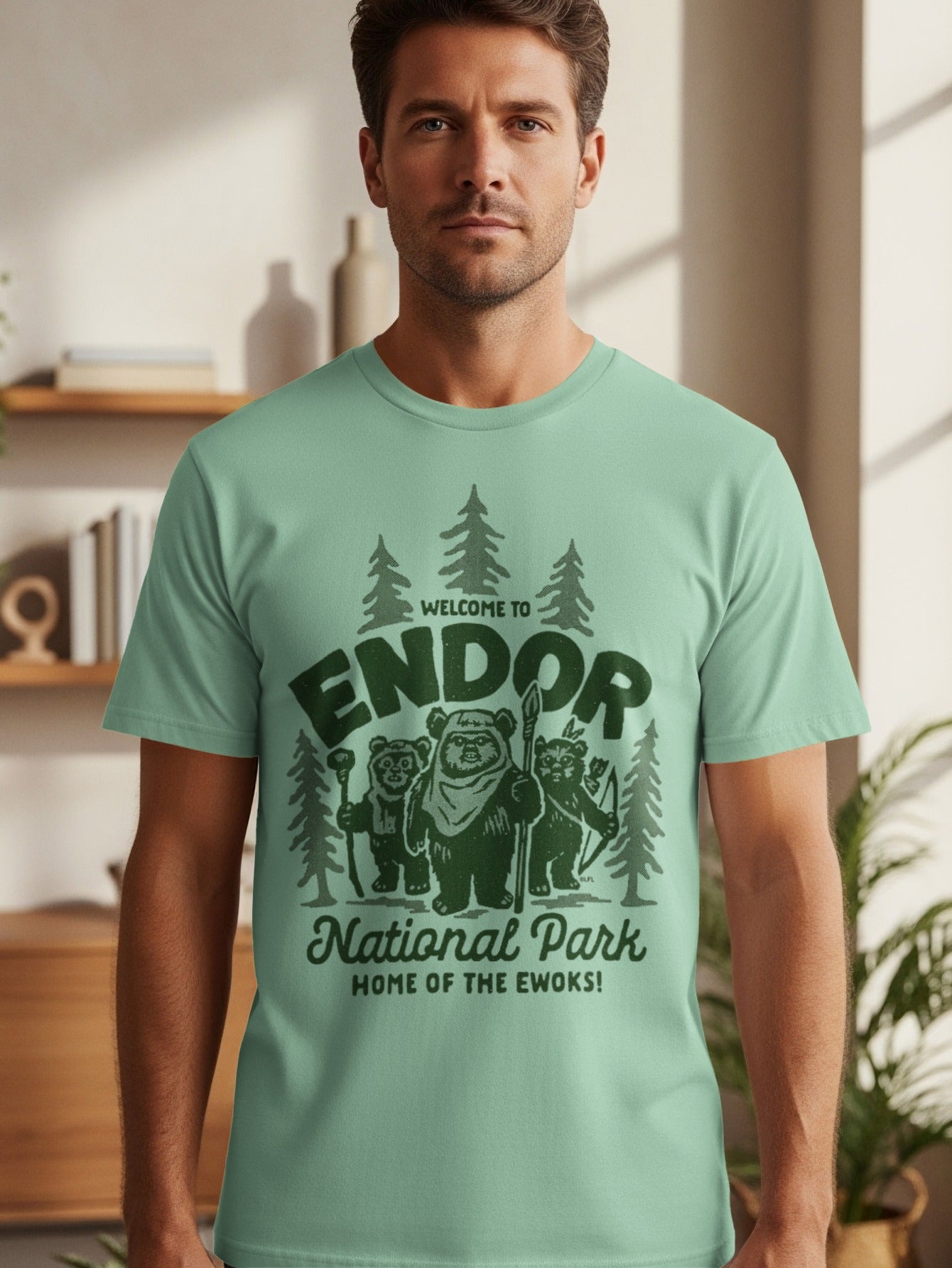 Green t-shirt with Ewoks, trees, and text: "Welcome to Endor National Park Home of the Ewoks!"