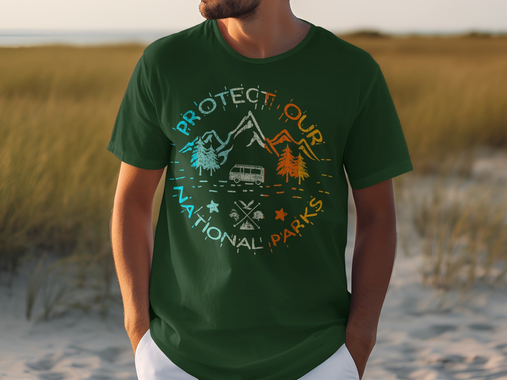 Green t-shirt with "PROTECT OUR NATIONAL PARKS" circular graphic with mountains, trees, and a van.