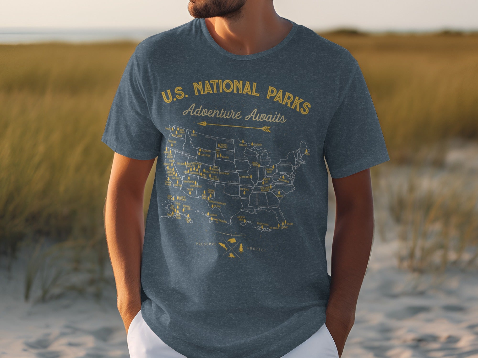 Dark blue t-shirt with a U.S. National Parks map and the text "Adventure Awaits".