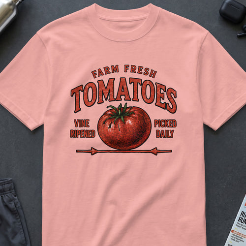 Pink t-shirt with a distressed graphic of a tomato and text: Farm Fresh Tomatoes, Vine Ripened, Picked Daily.