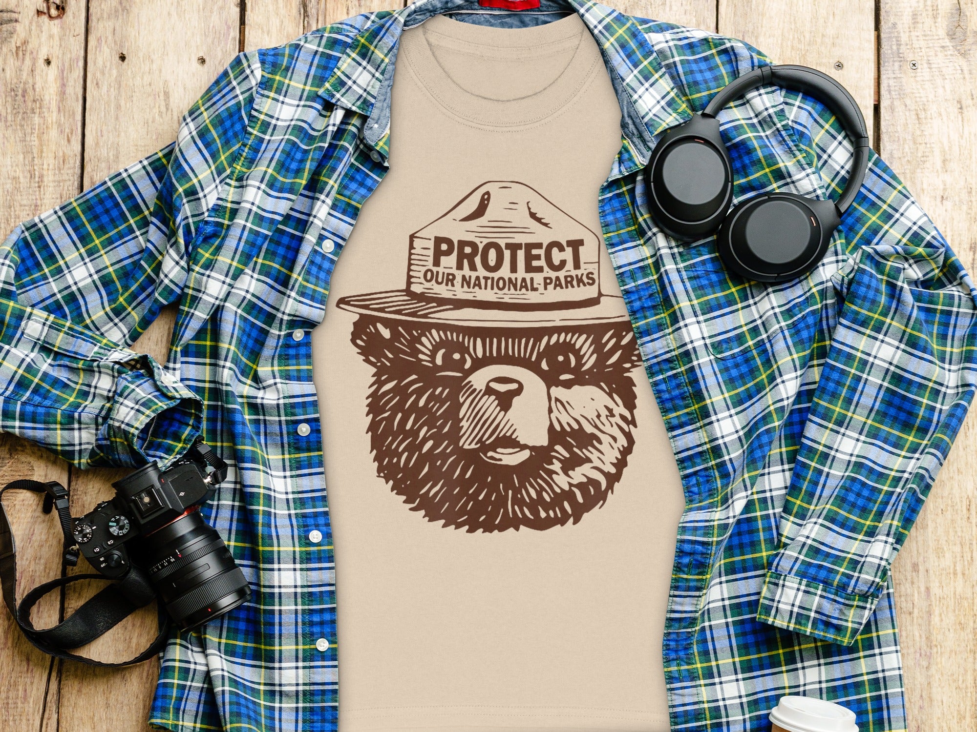 T-shirt with a bear wearing a park ranger hat and text "Protect Our National Parks".