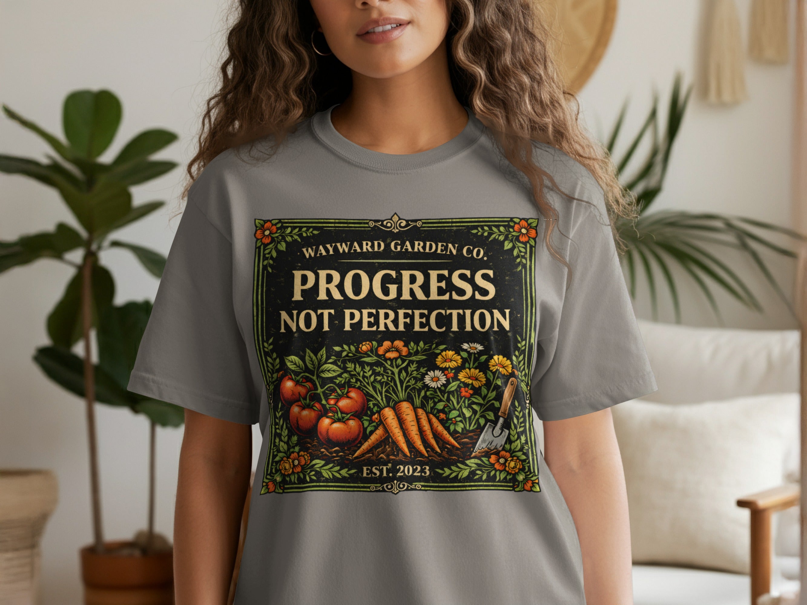 Gray t-shirt with Wayward Garden Co. logo featuring vegetables and text.