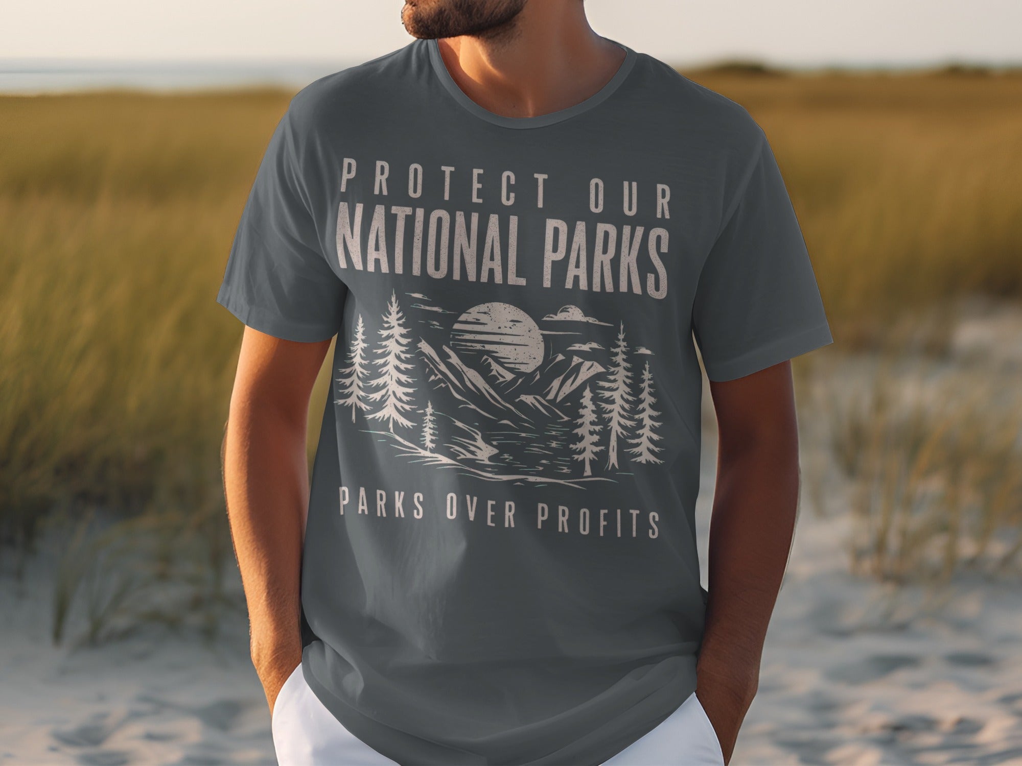 Dark grey t-shirt with "Protect Our National Parks" and "Parks Over Profits" text.