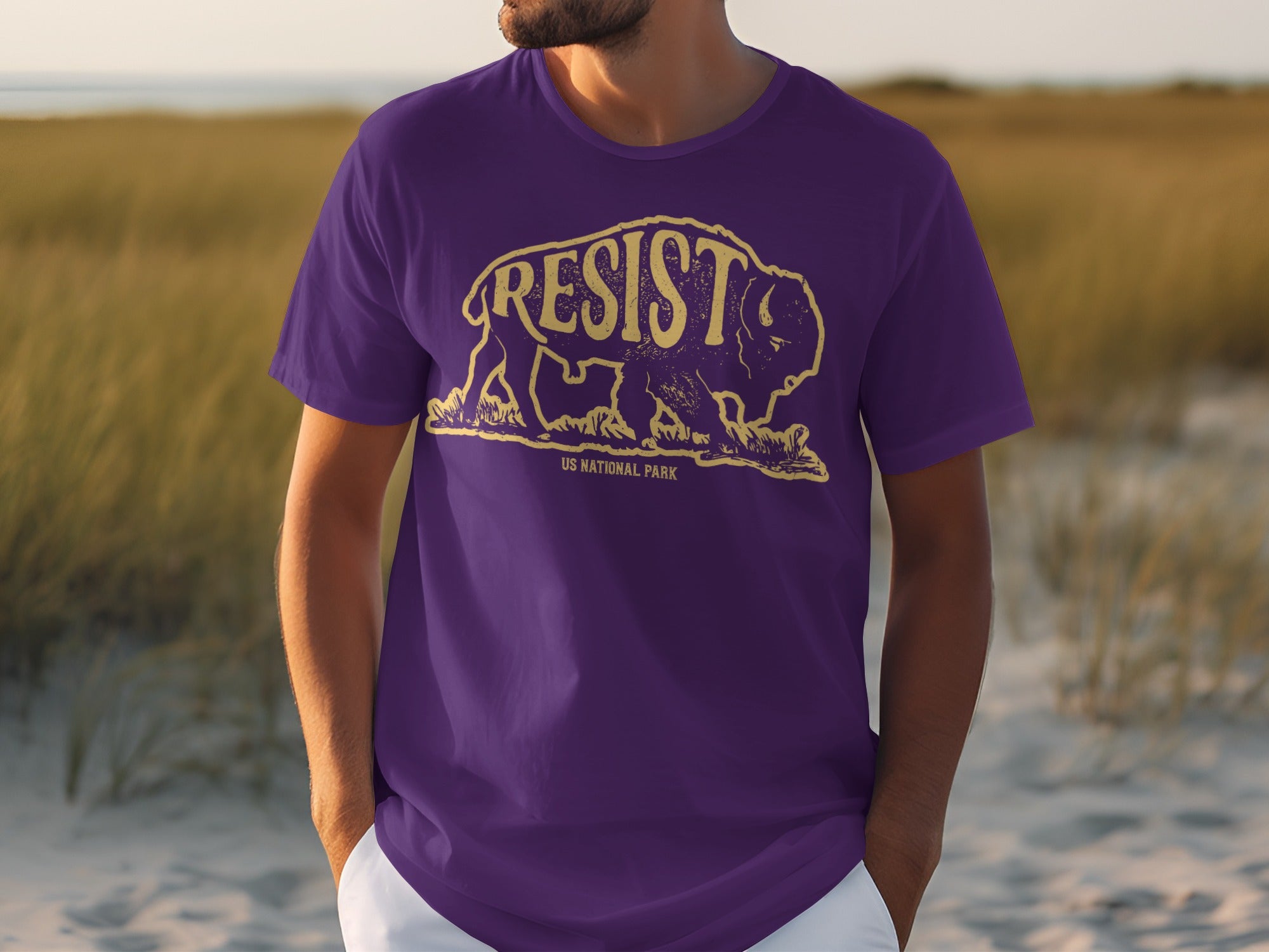 Purple t-shirt with a distressed bison graphic and "RESIST" text.