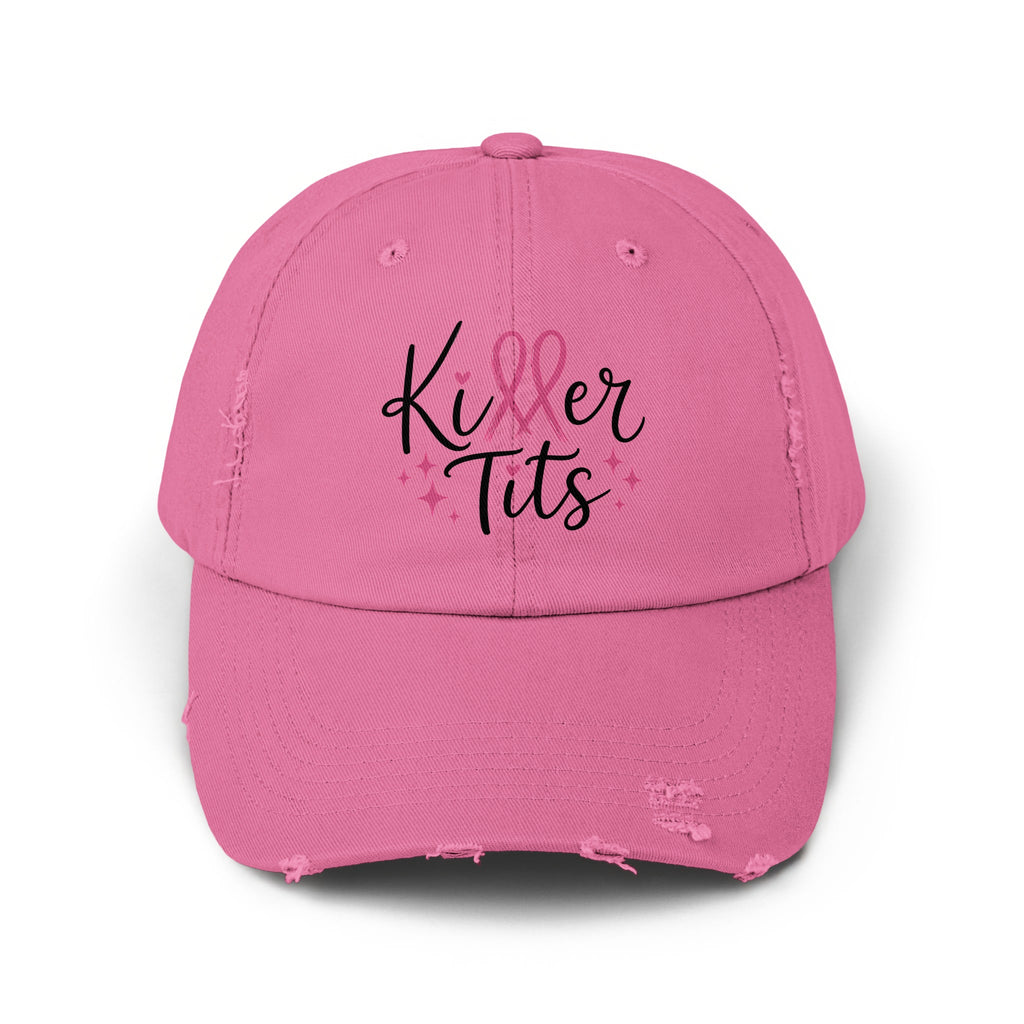 Pink distressed baseball cap with "Killer Tits" text and pink ribbons.