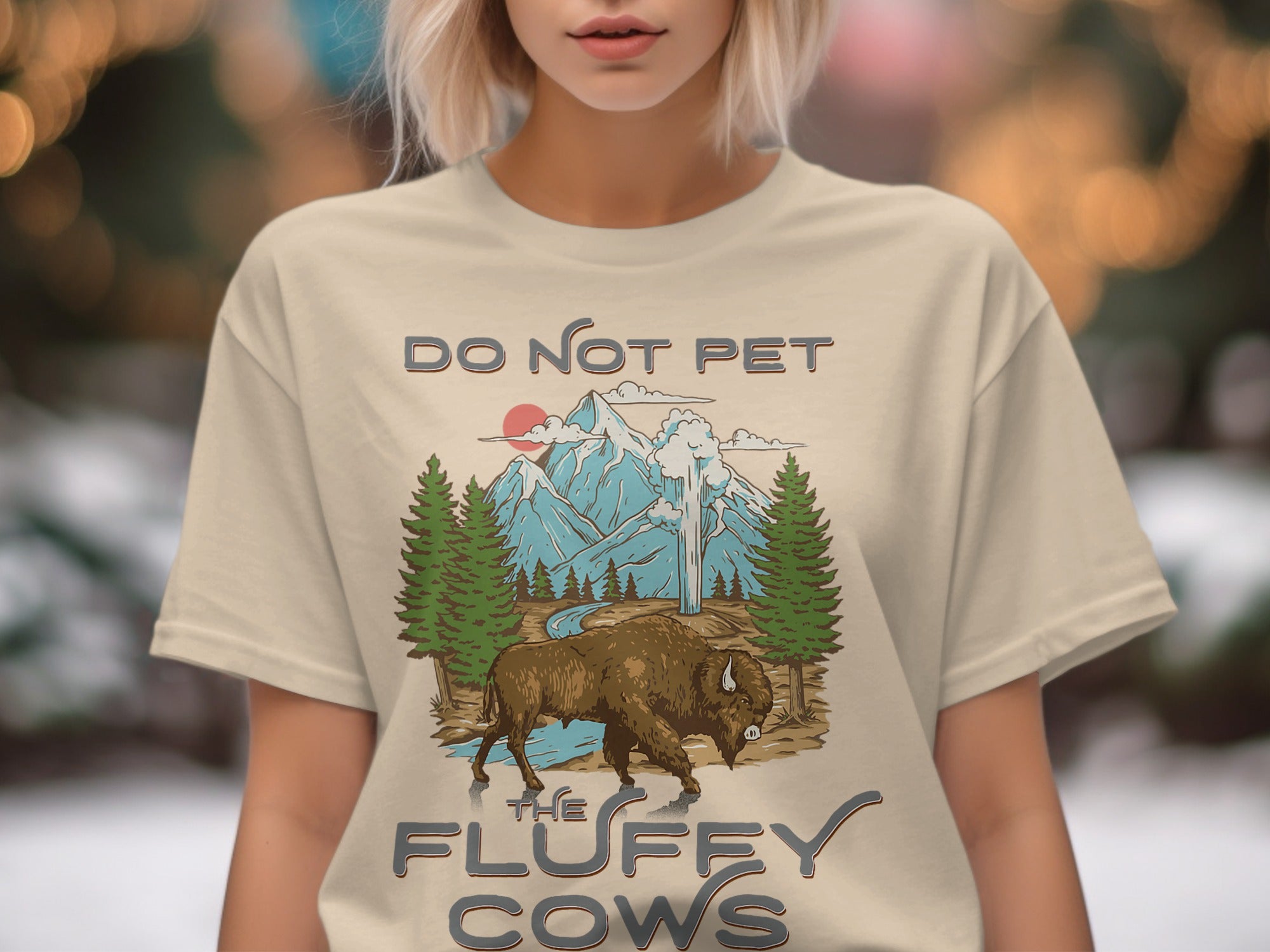 T-shirt graphic with text "DO NOT PET" and a buffalo in a mountainous landscape.
