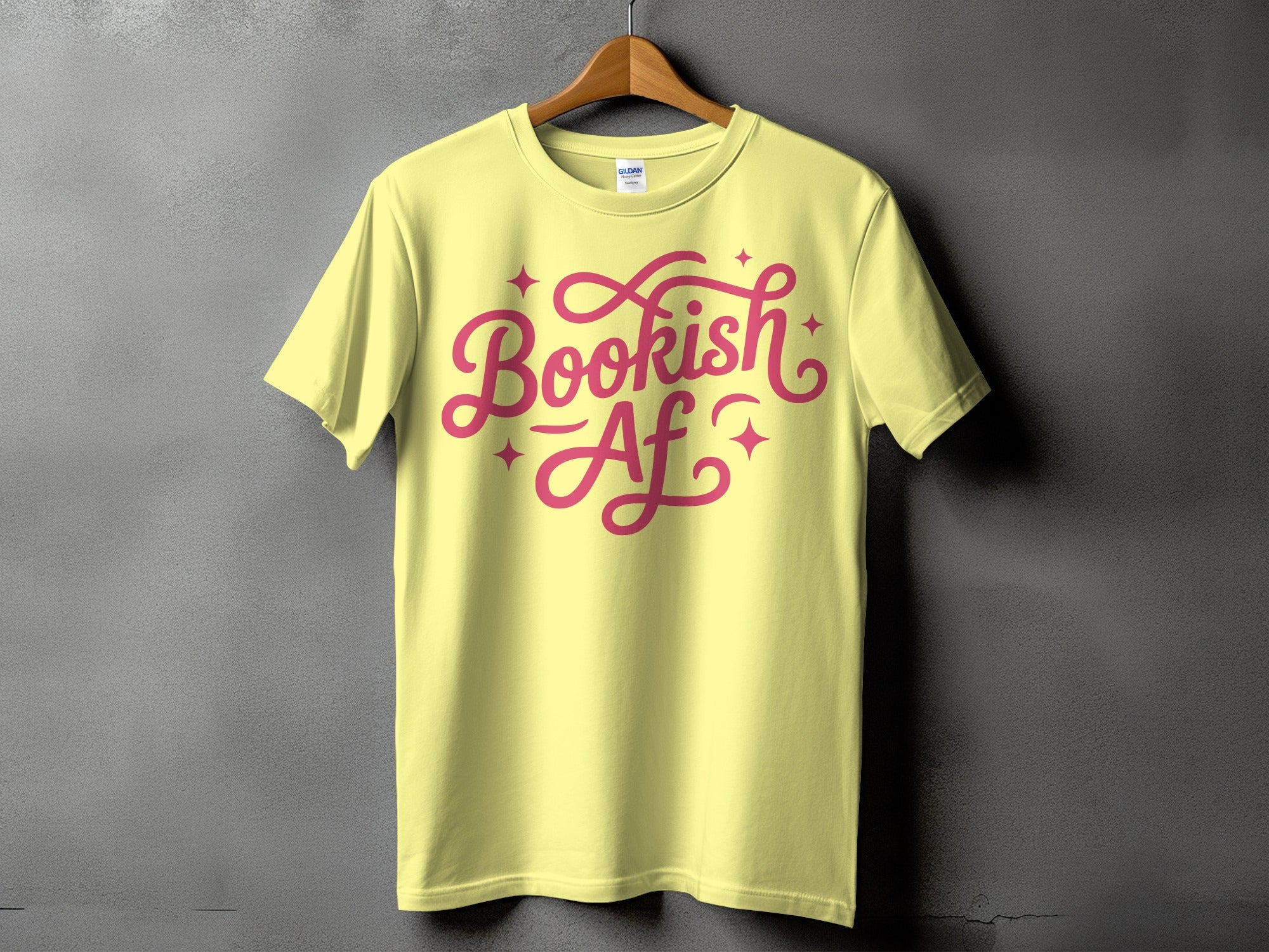 Yellow t-shirt with pink "Bookish Af" text and star graphics.