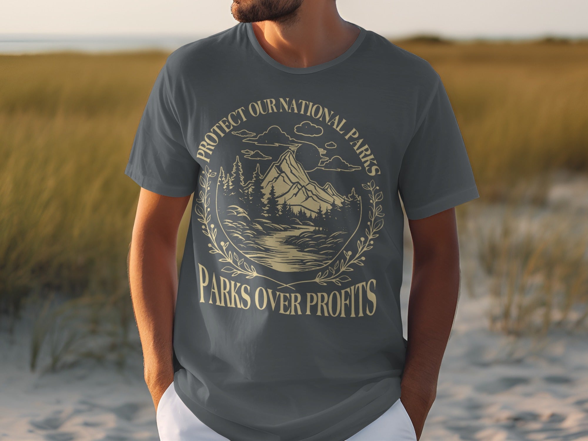 Grey t-shirt with "Protect Our National Parks" and "Parks Over Profits" text and mountain graphic.