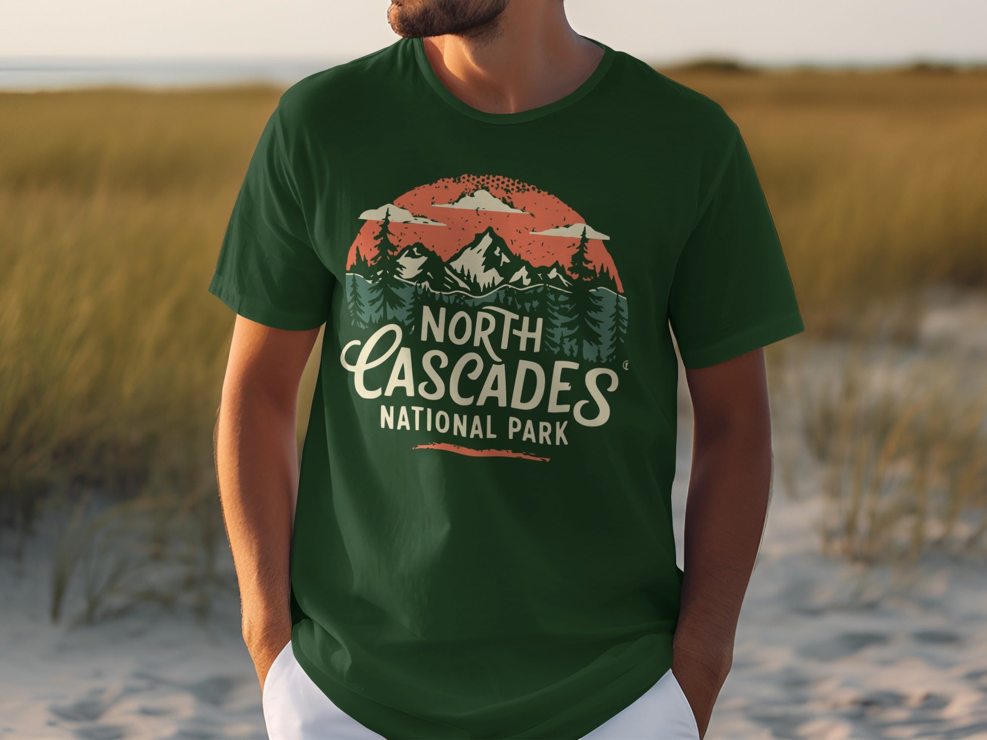 Green shirt with North Cascades National Park graphic featuring mountains and trees.
