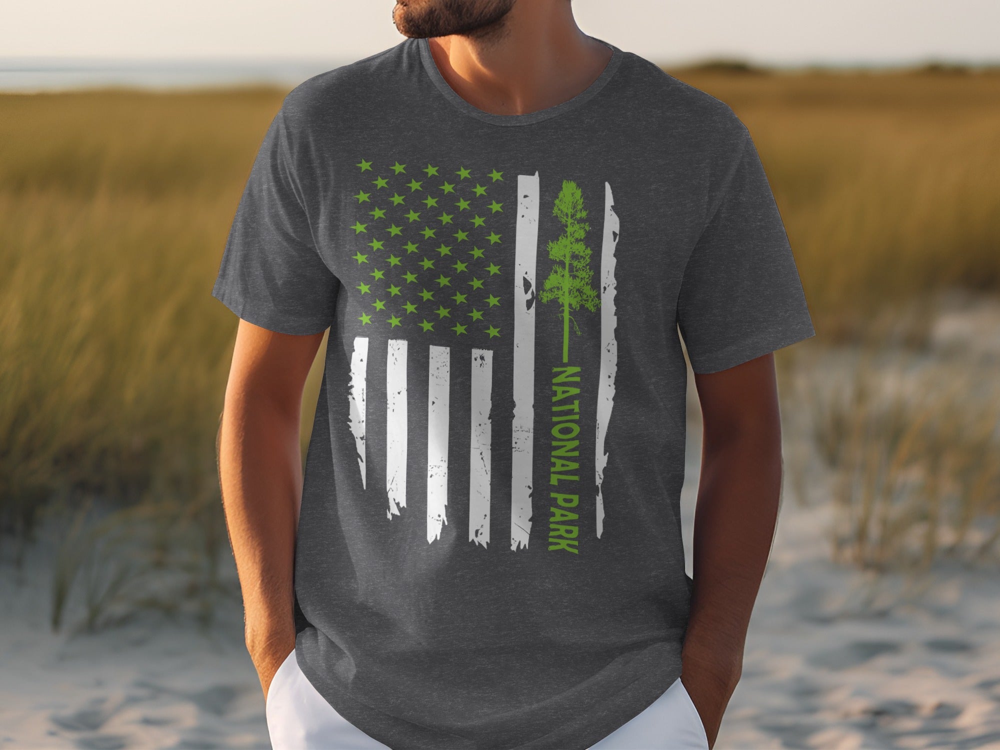 Dark grey t-shirt featuring an American flag graphic with green stars and a tree.