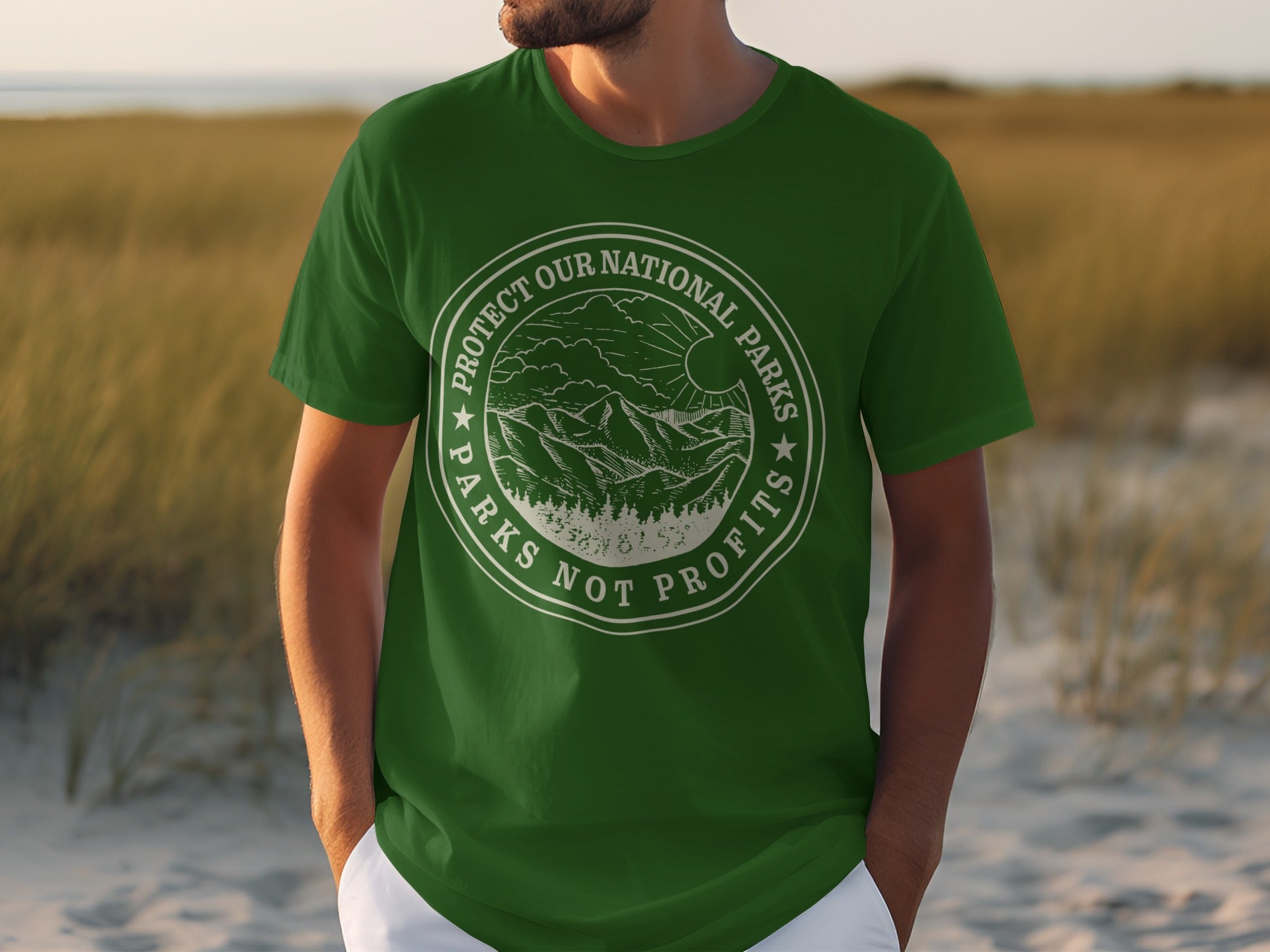Green t-shirt with circular "Protect Our National Parks Not Profits" graphic.
