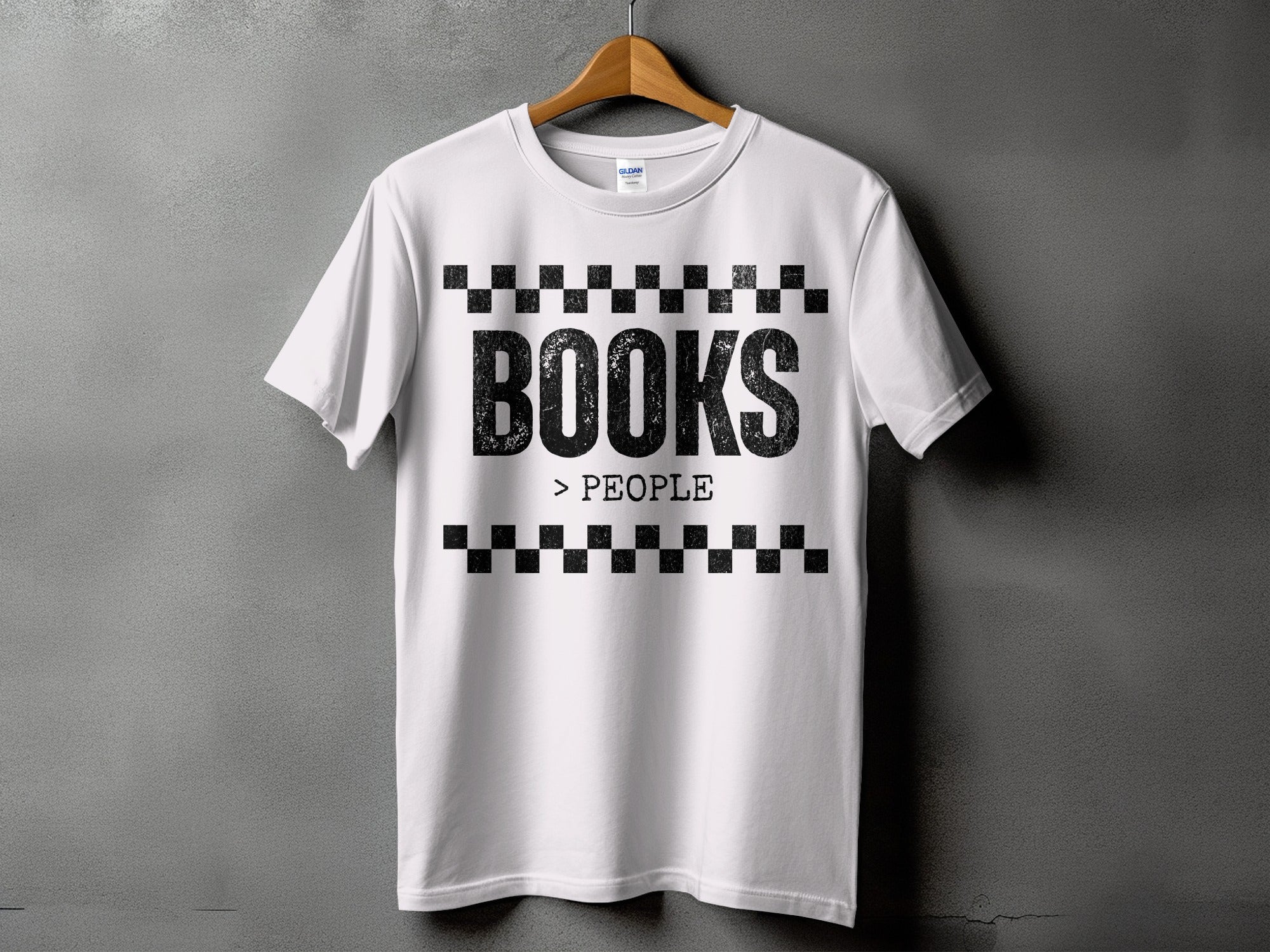 White t-shirt with black text "BOOKS > PEOPLE" between checkered bands.