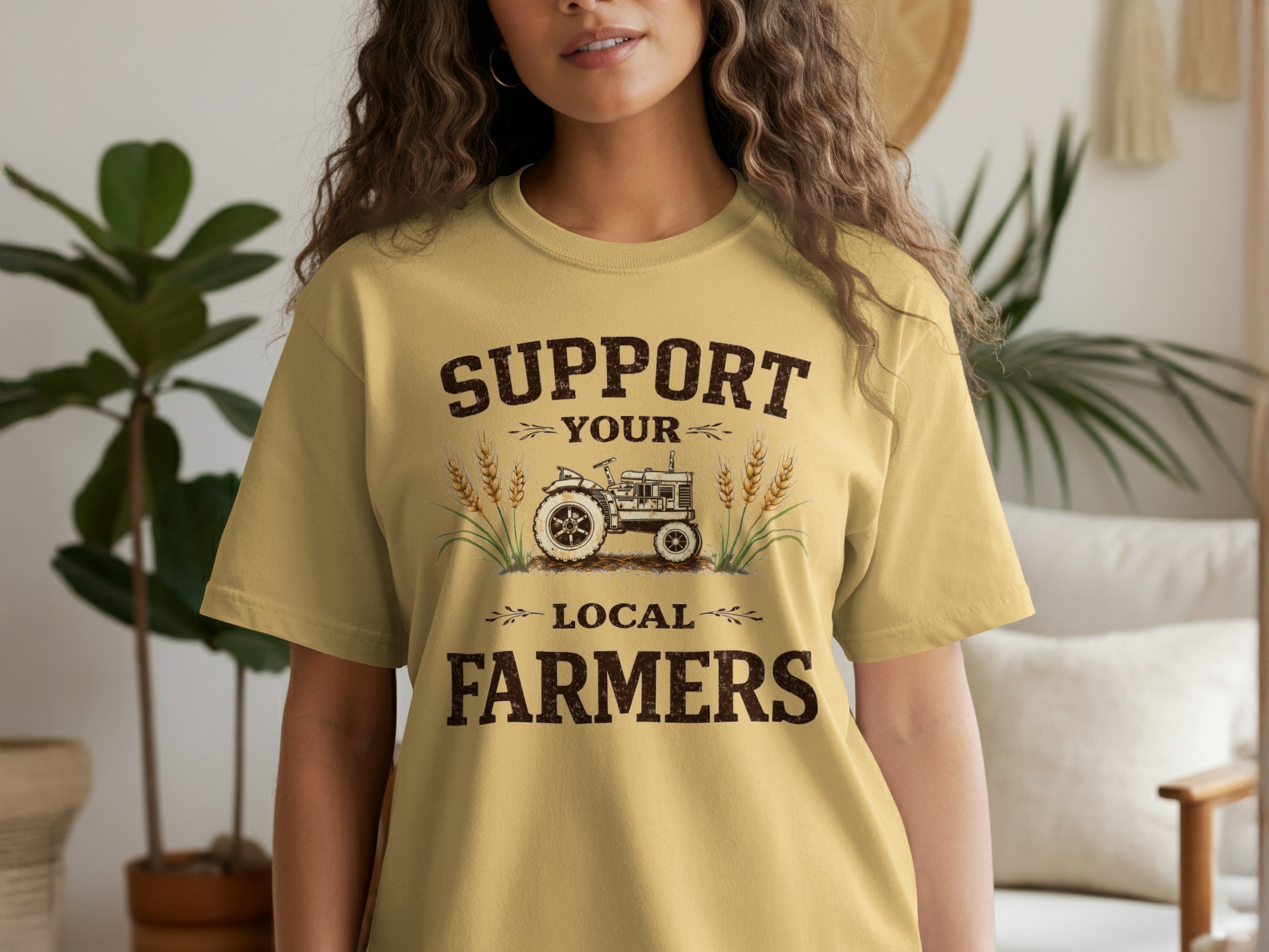 Light yellow t-shirt with "Support Your Local Farmers" text and a tractor graphic.