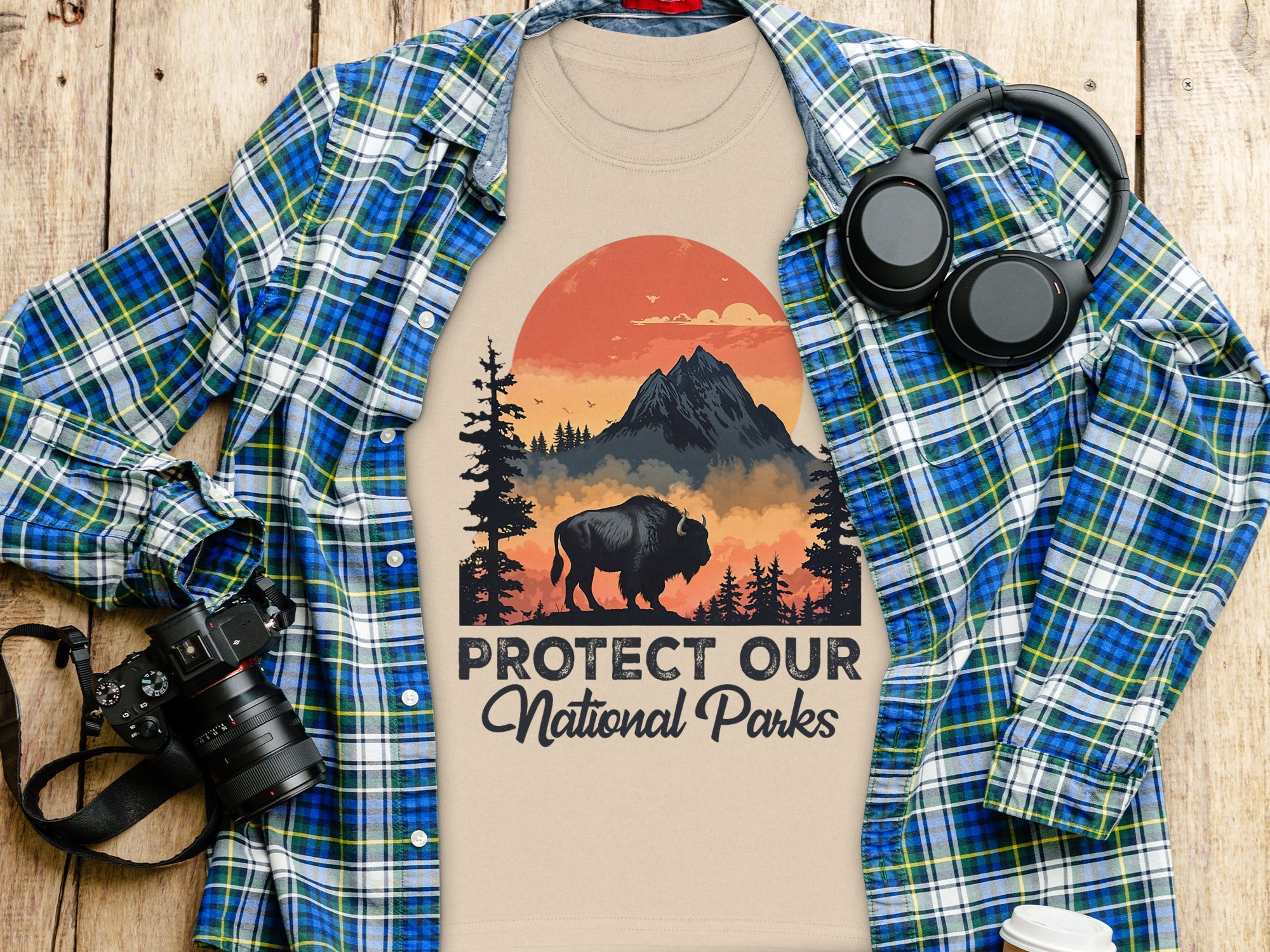 T-shirt with bison, mountains, forest, and "Protect Our National Parks" text.
