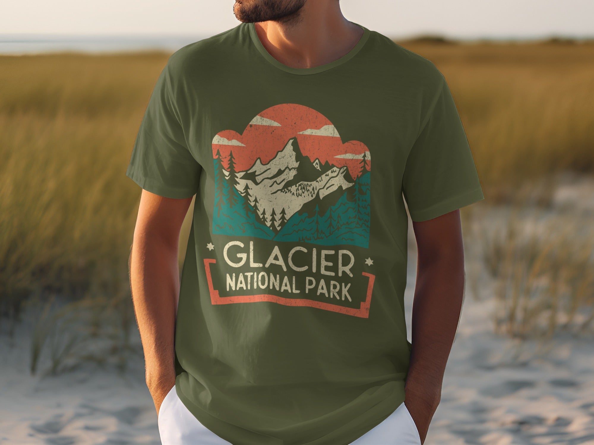 Green t-shirt with Glacier National Park mountain graphic and text.