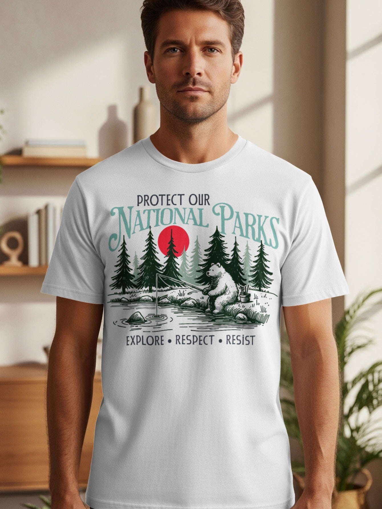 White t-shirt with "Protect Our National Parks" text and a bear fishing by a lake.