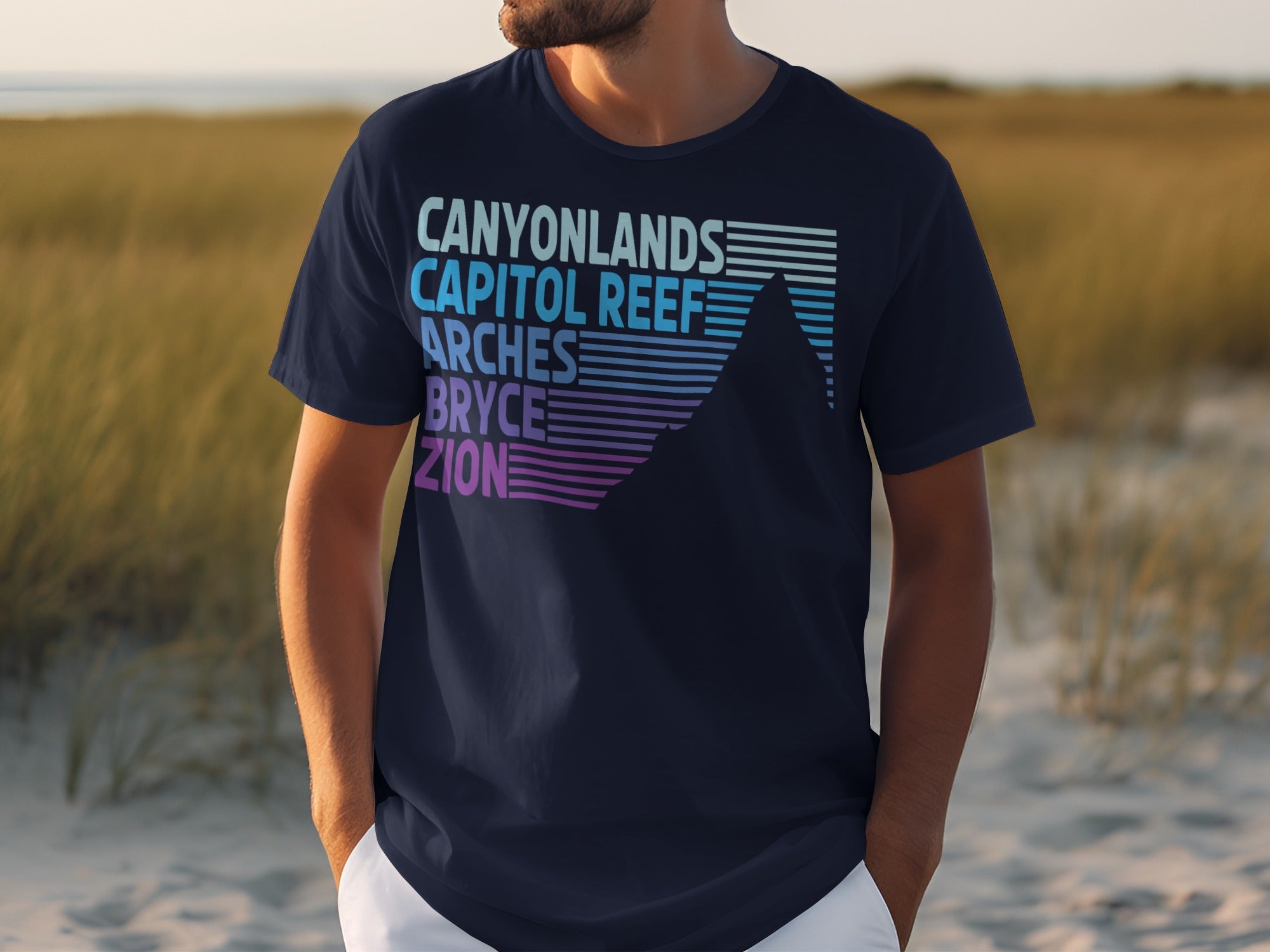 Navy t-shirt with list of Utah national parks and mountain graphic.