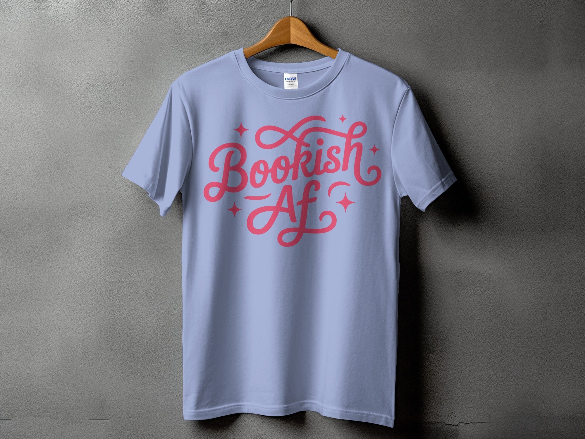 Light blue t-shirt with pink "Bookish Af" text and small stars.