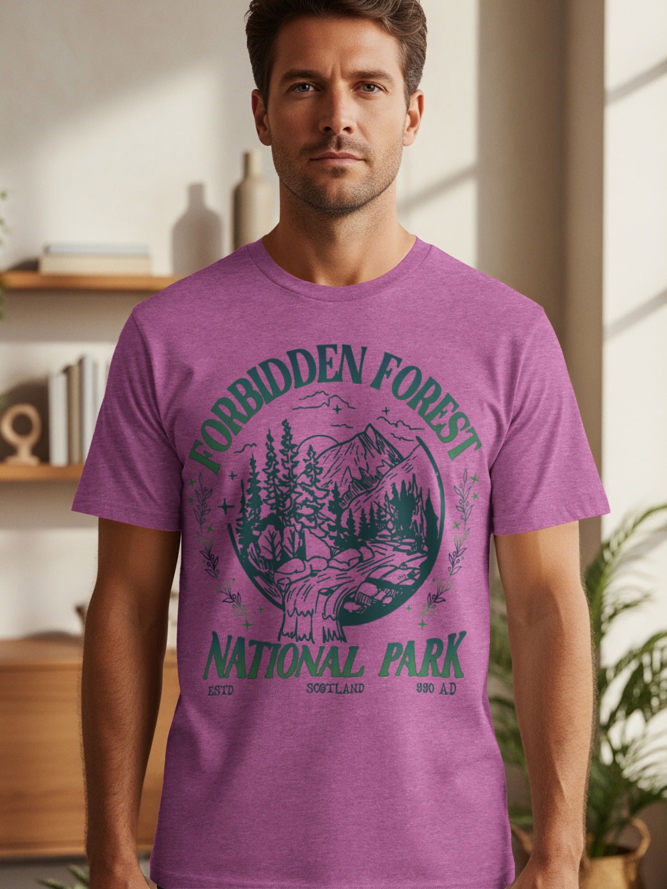 Purple t-shirt with green "Forbidden Forest National Park Scotland" graphic.