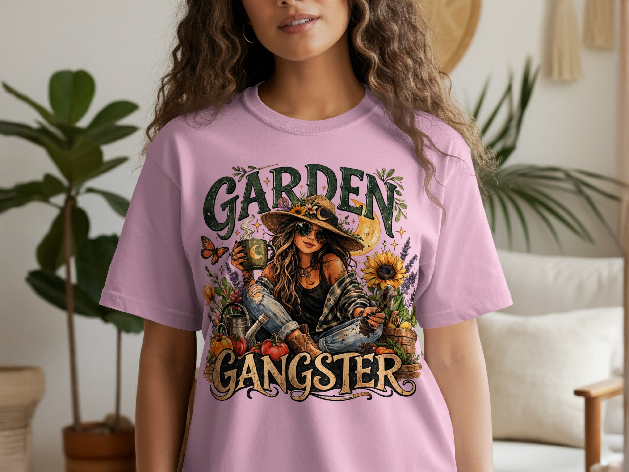Pink t-shirt graphic with texts GARDEN GANGSTER, woman and gardening elements.