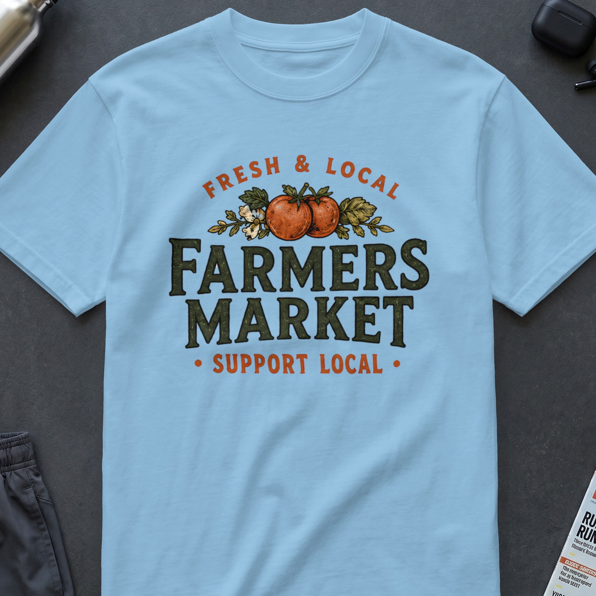 Light blue t-shirt with "FARMERS MARKET" text and tomato graphic.