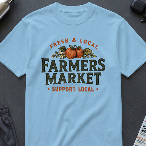 Light blue t-shirt with "FARMERS MARKET" text and tomato graphic.