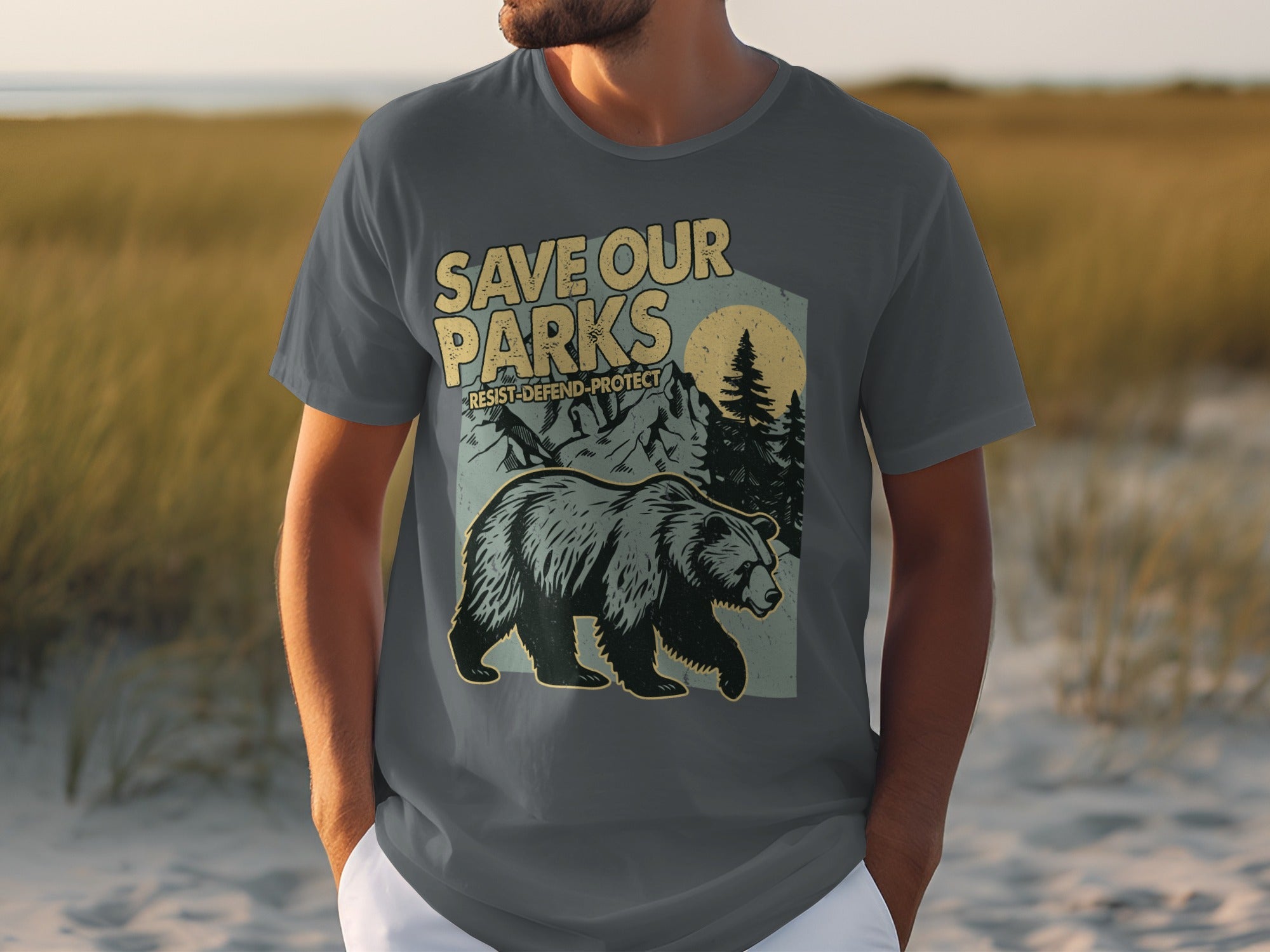 T-shirt with a bear and mountain graphic that says "Save Our Parks".