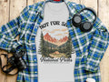 T-shirt with "Not For S*" text and national park graphic, featuring headphones and camera.