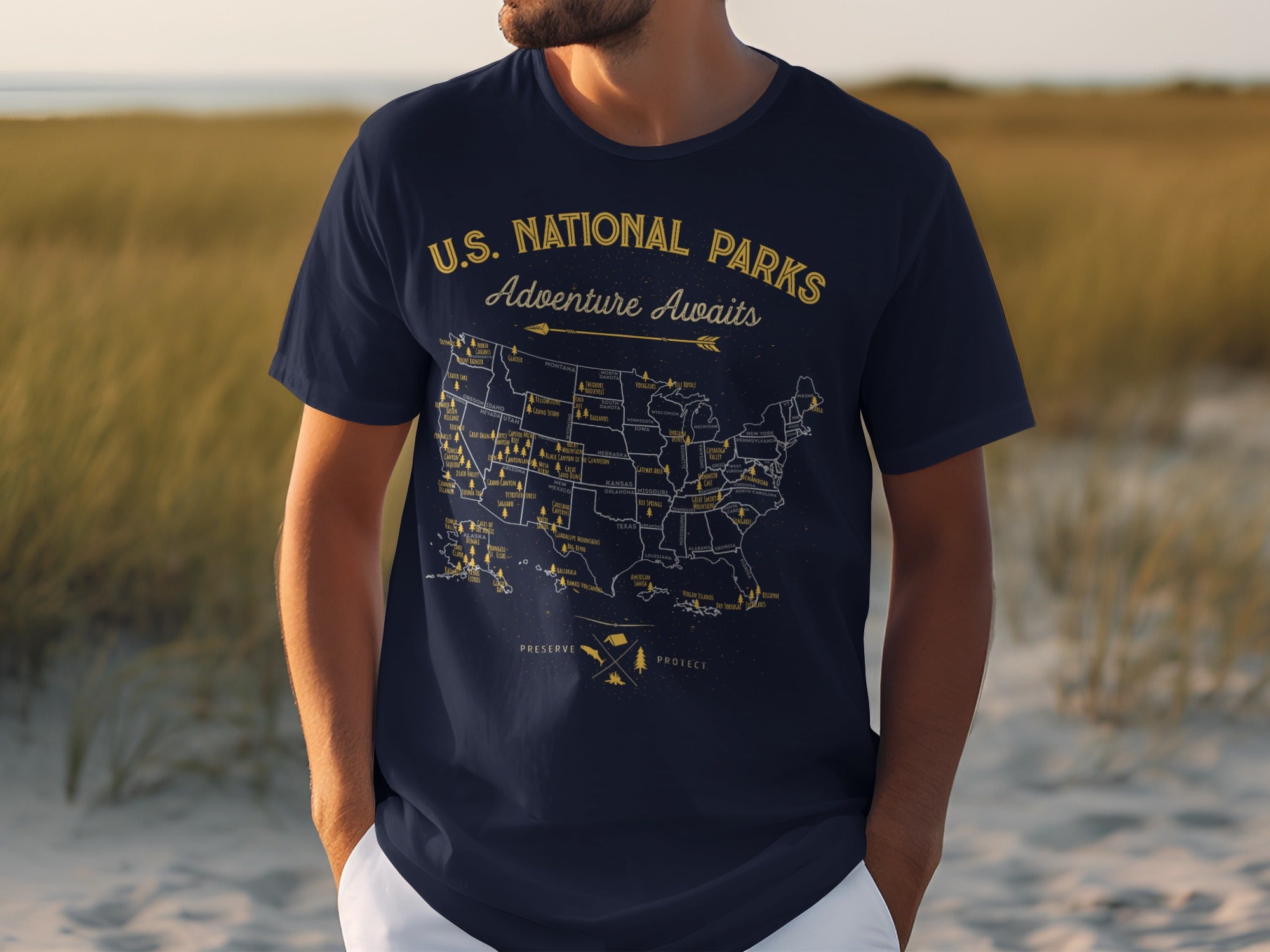 Navy t-shirt with a U.S. National Parks map and "Adventure Awaits" text.