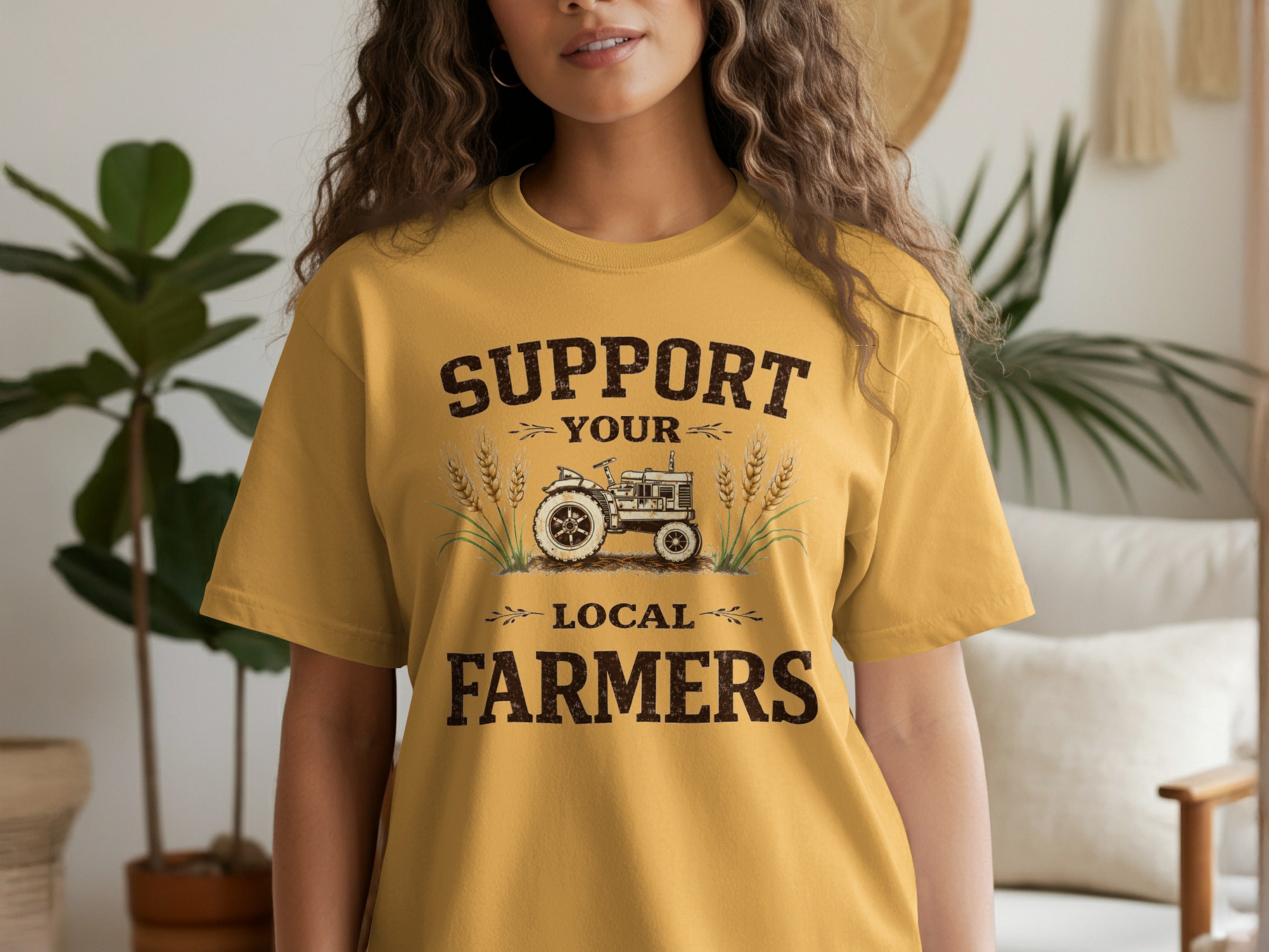 Yellow t-shirt with "Support Your Local Farmers" text and tractor graphic.
