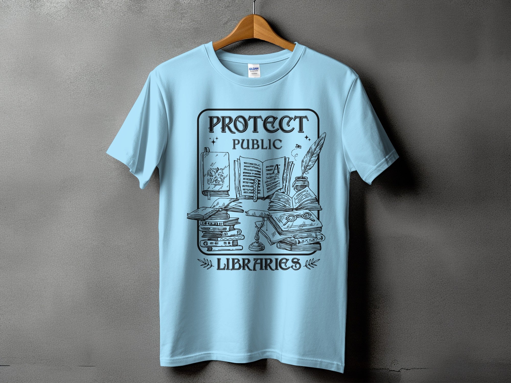 Light blue t-shirt with "Protect Public Libraries" text and book illustration.