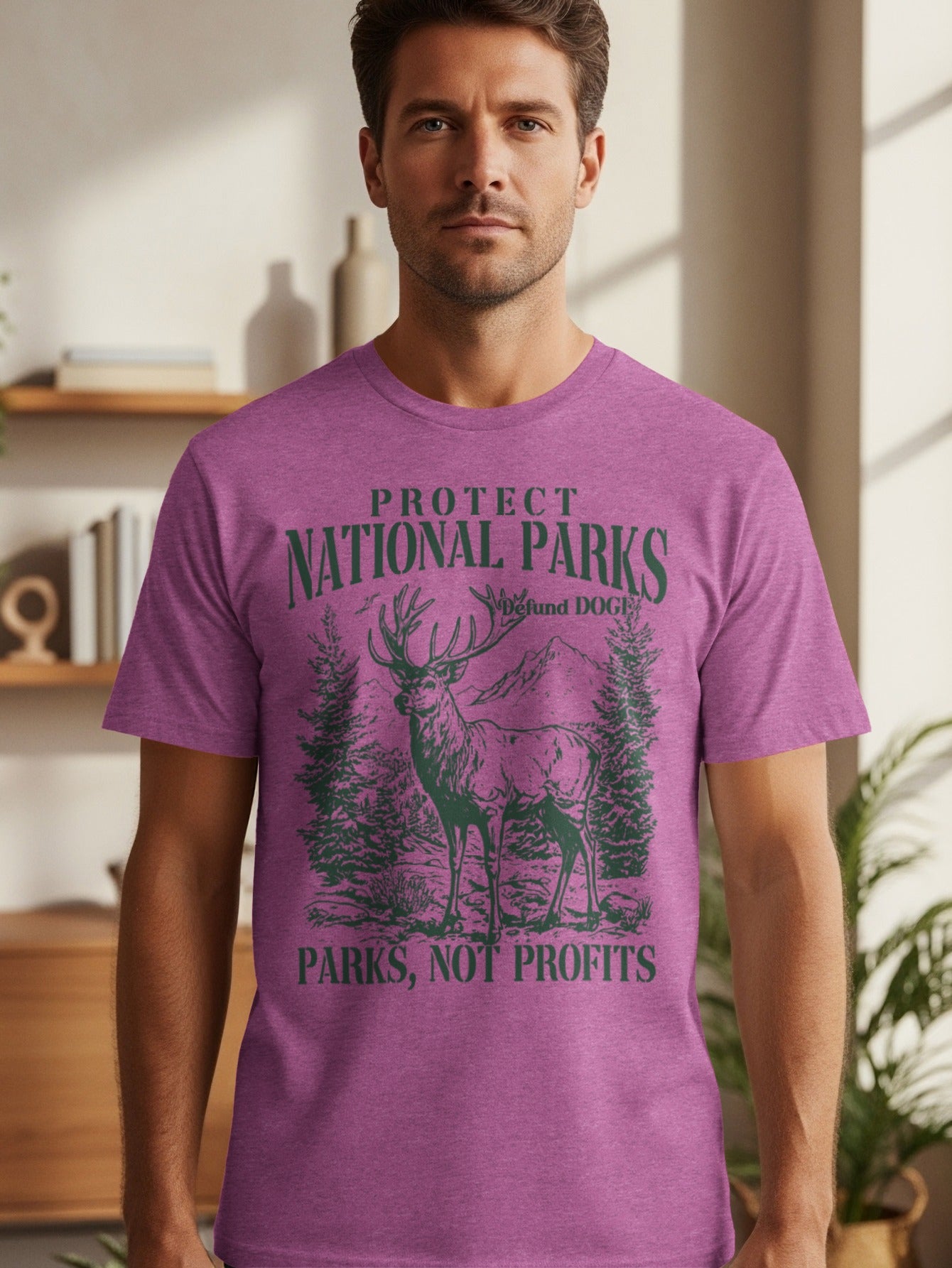 T-shirt with deer and trees graphic that says "Protect National Parks" and "Parks, Not Profits".