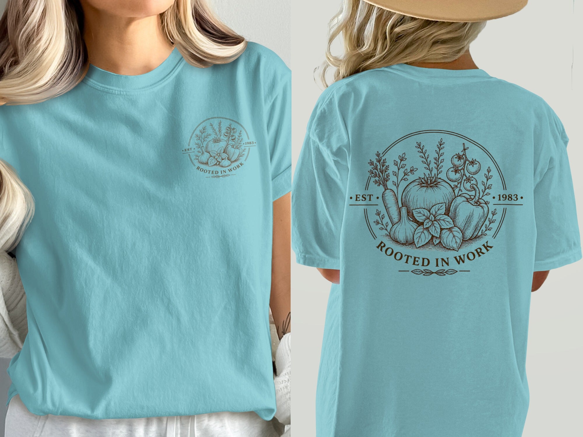 Teal t-shirt with round graphic of vegetables and text "Rooted in Work".
