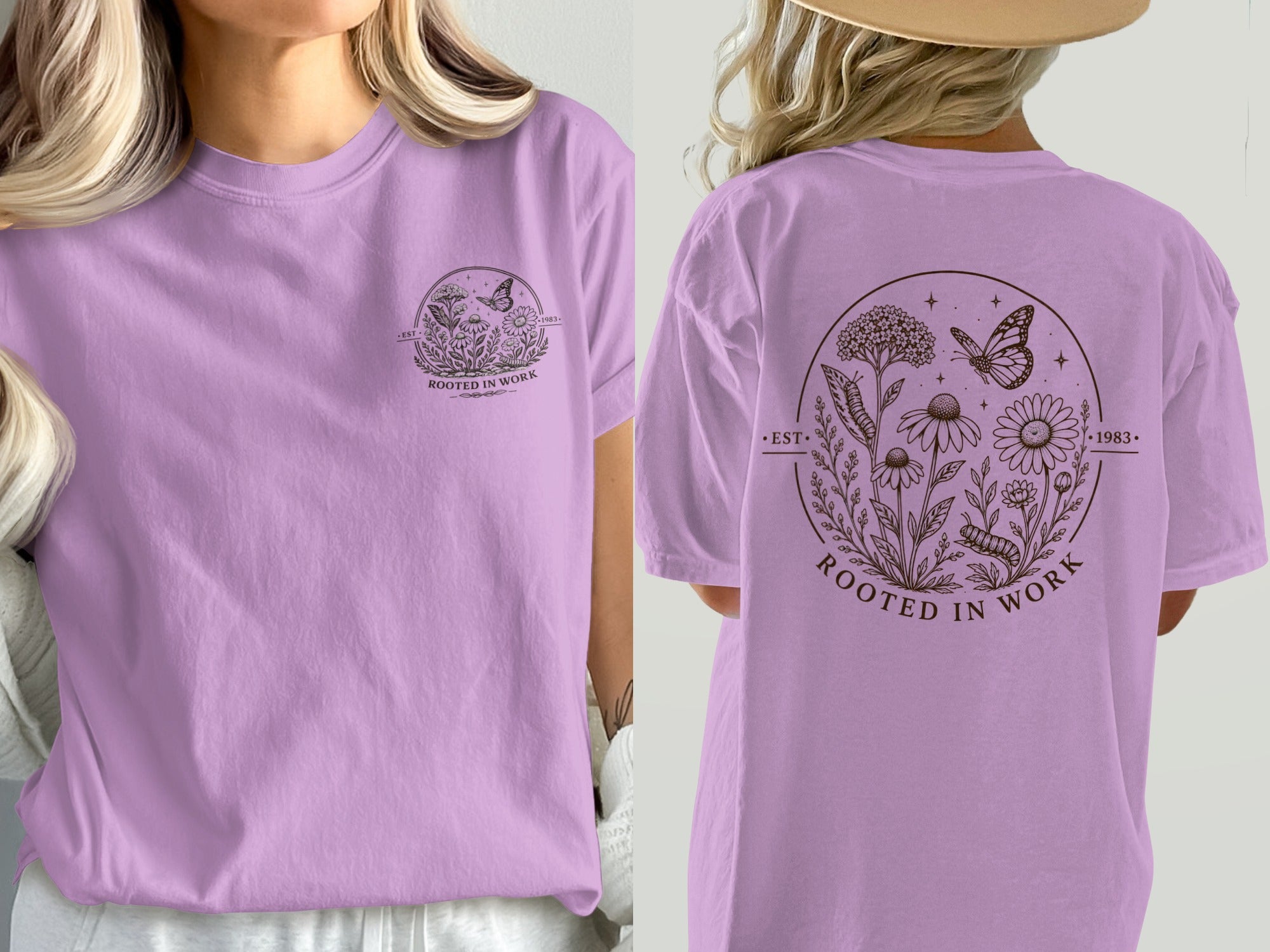 Lavender t-shirt with black circular floral and butterfly graphic and "ROOTED IN WORK" text.