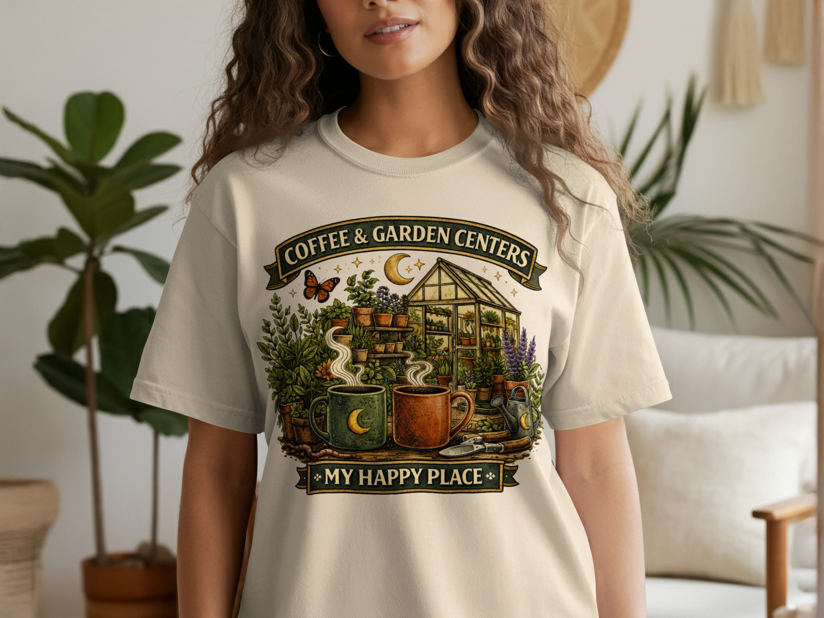Shirt with a graphic featuring coffee mugs, plants, a greenhouse, and the text "COFFEE & GARDEN CENTERS MY HAPPY PLACE".