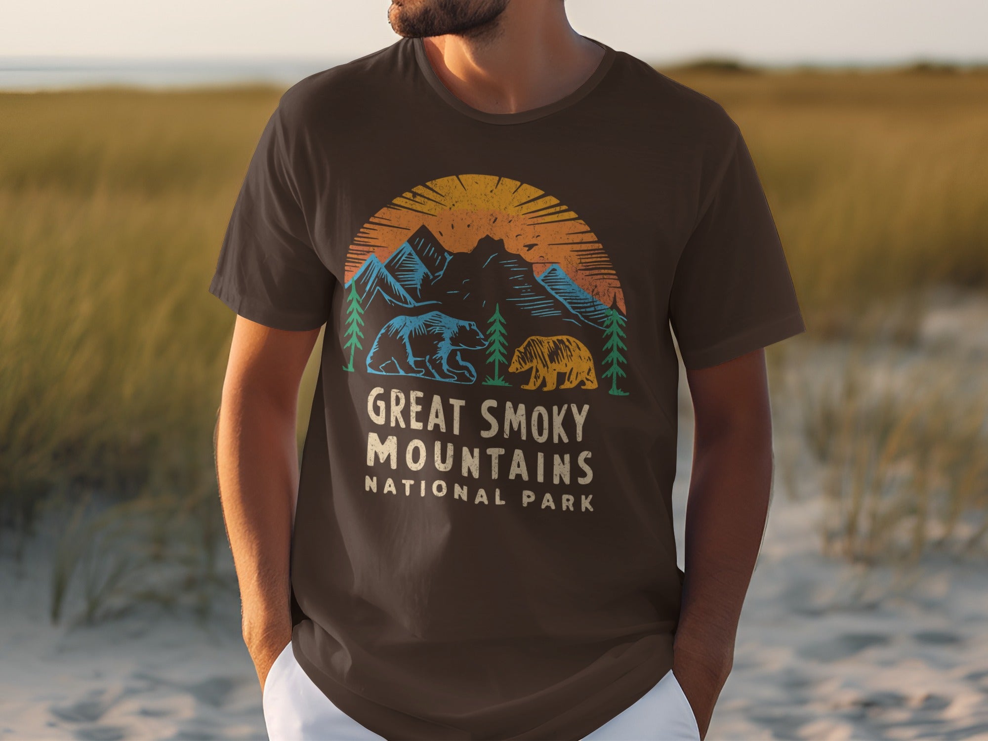 Brown t-shirt with graphic of mountains, sun, trees, and two bears, reading "Great Smoky Mountains National Park".